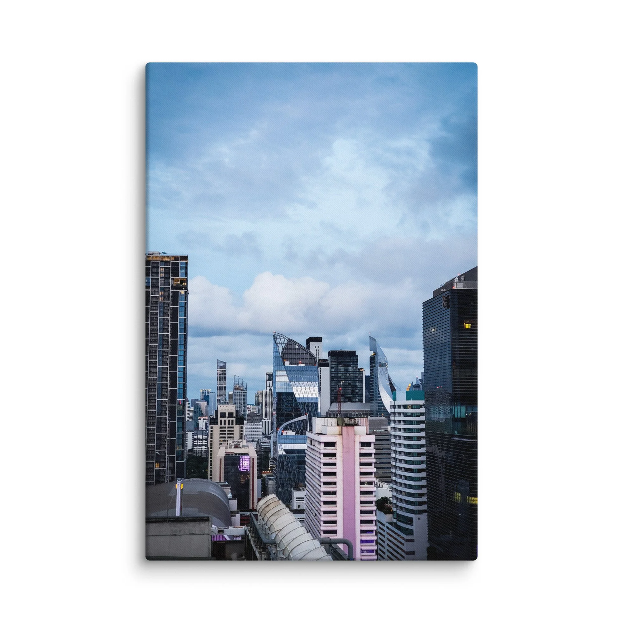 Elegant twilight Bangkok skyline from high-rise with modern skyscrapers, curved glass facades and soft cloudy sky – Thailand urban travel photography canvas print wall art decor