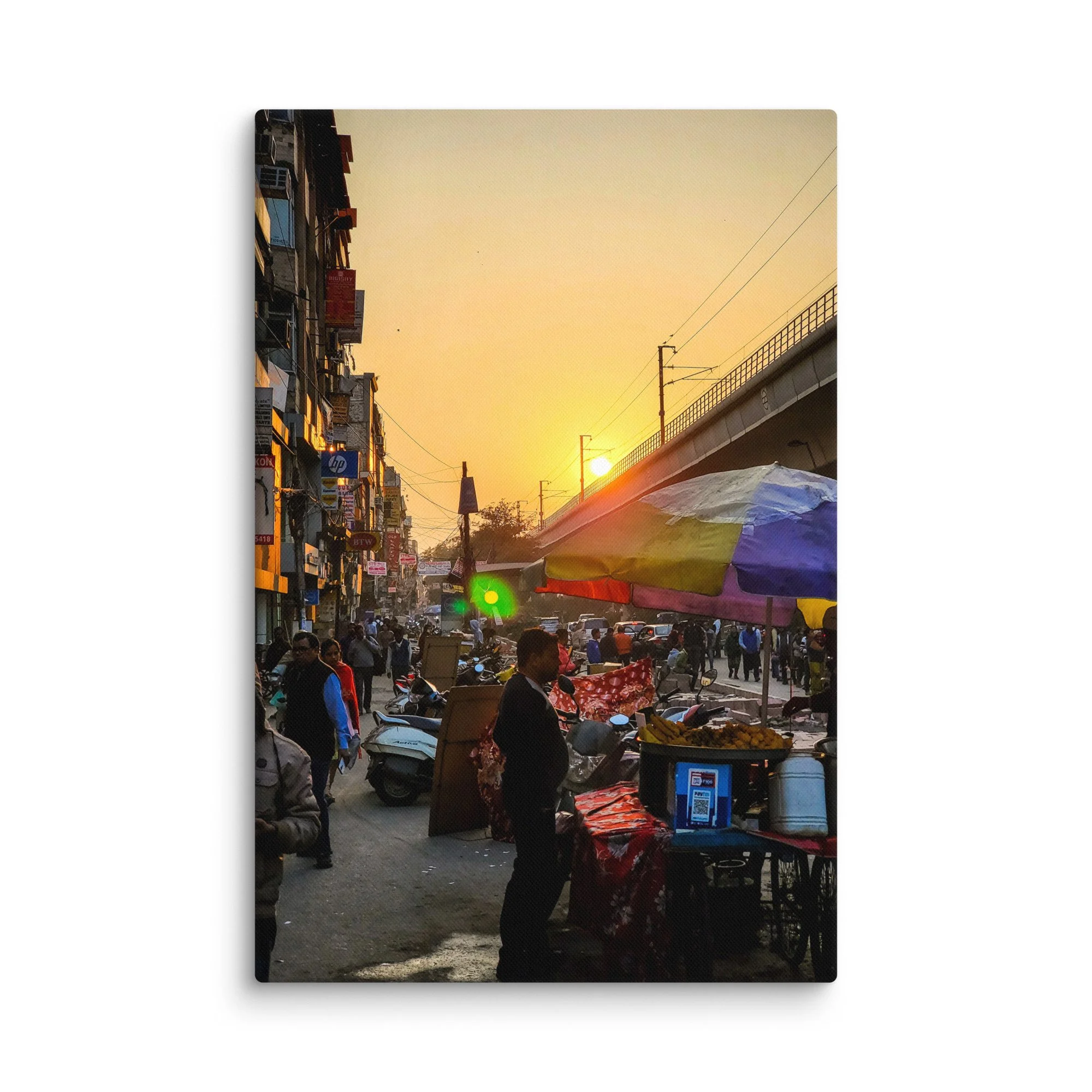 Golden sunset over bustling Delhi Paharganj street with shop signs, overhead wires, scooters and crowds – authentic India travel photography canvas print wall art decor