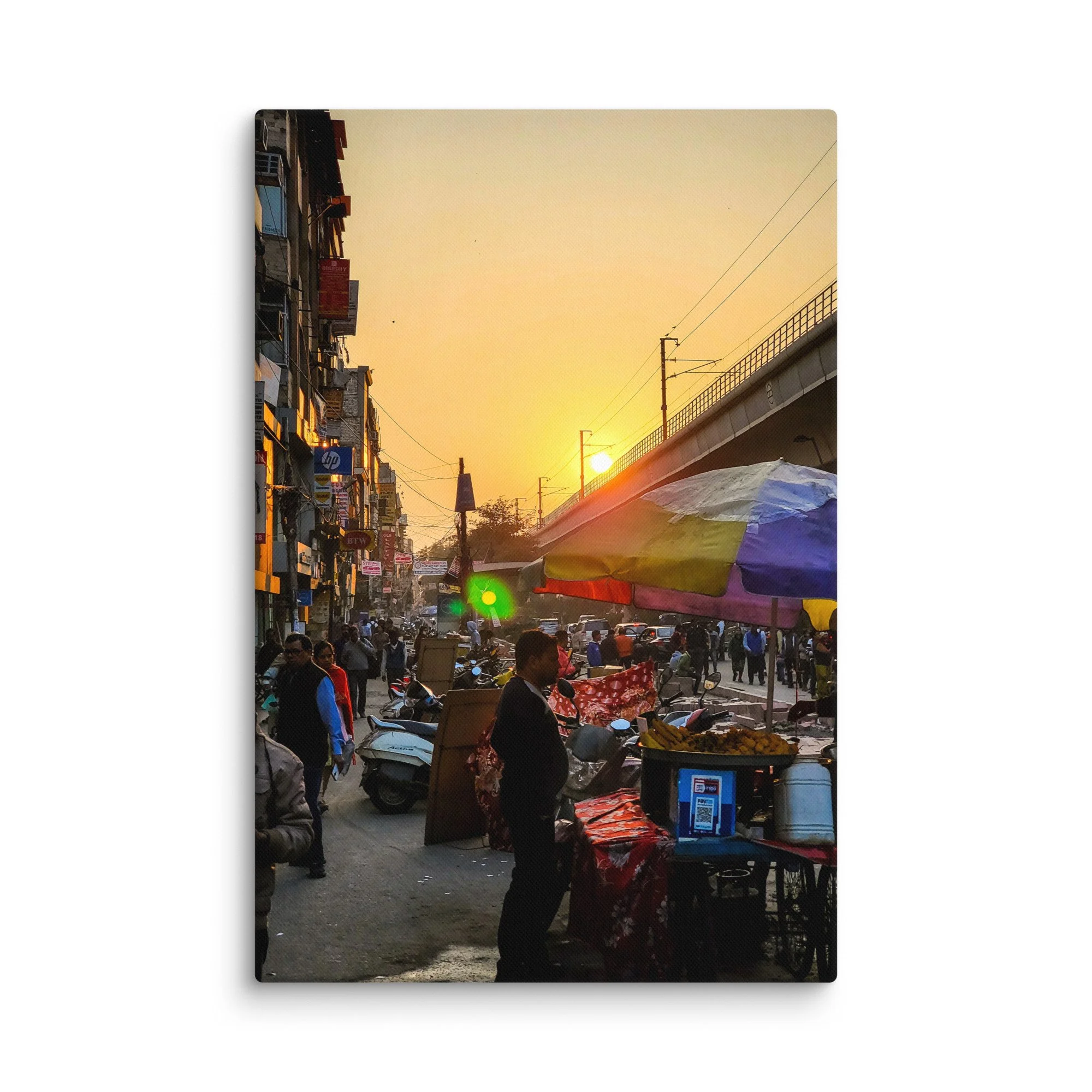 Golden sunset over bustling Delhi Paharganj street with shop signs, overhead wires, scooters and crowds – authentic India travel photography canvas print wall art decor