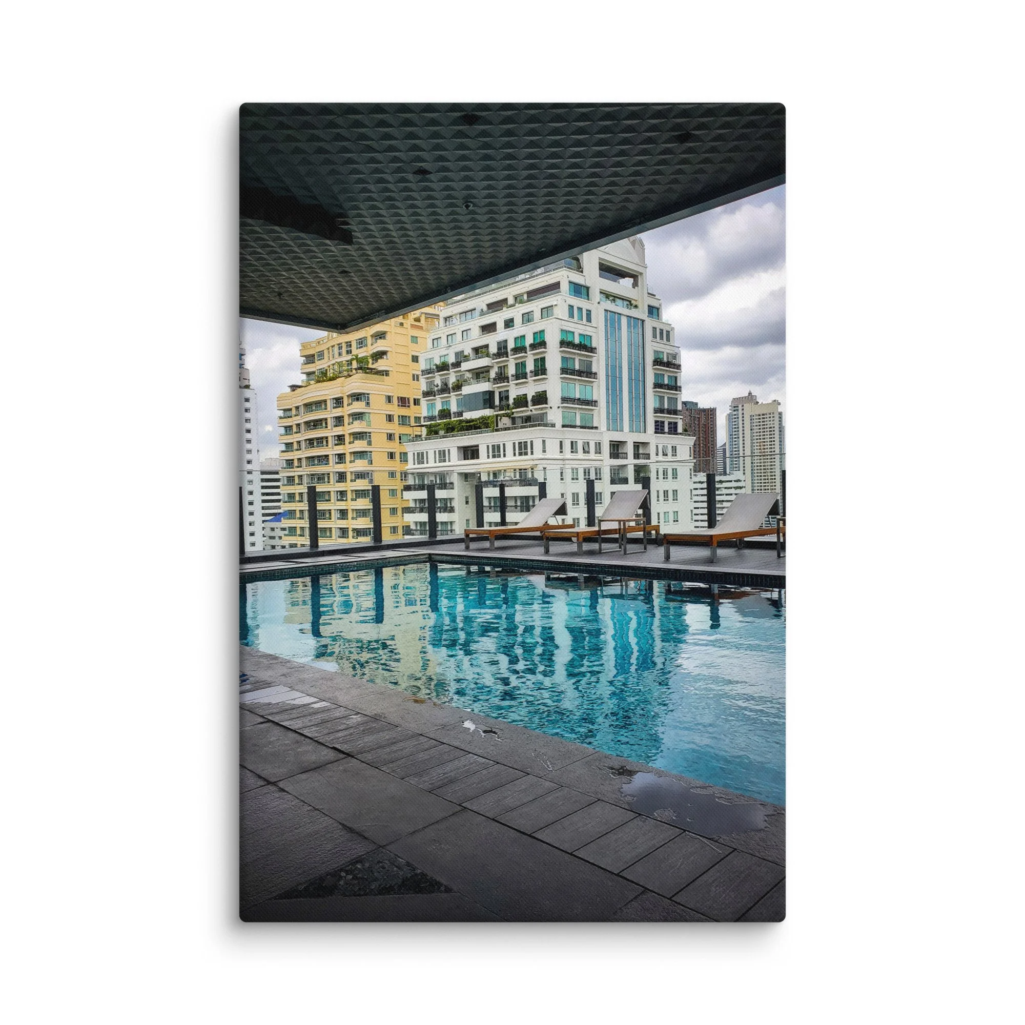 Luxurious Bangkok rooftop infinity pool overlooking modern skyscrapers and city skyline under cloudy sky – Thailand urban travel photography canvas print wall art decor