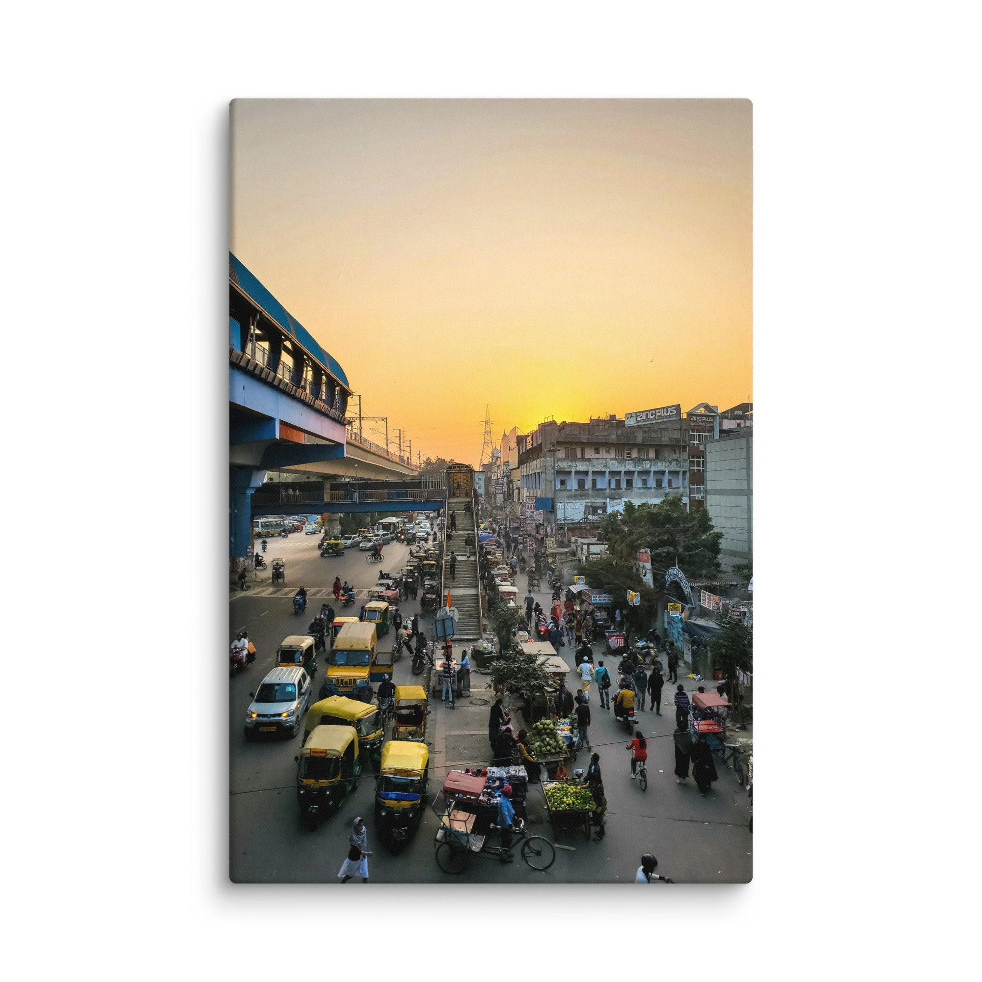 Golden sunset over bustling Delhi Paharganj street market with footbridge staircase, traffic, vendors and crowds – authentic India travel photography canvas print wall art decor
