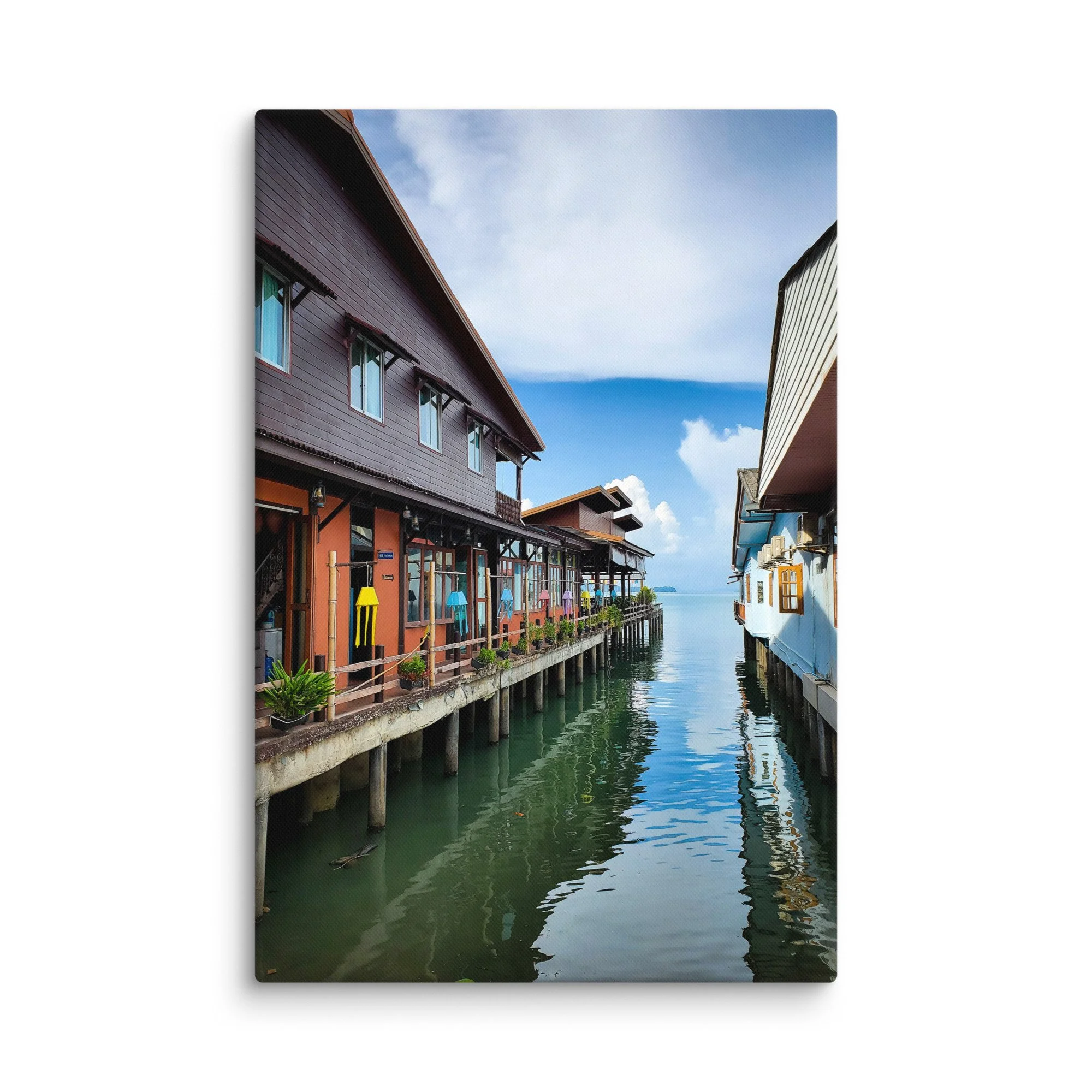 Serene Thai island pier with colorful longtail boats, gentle waves and green hills under cloudy sky – authentic Thailand travel photography canvas print wall art decor