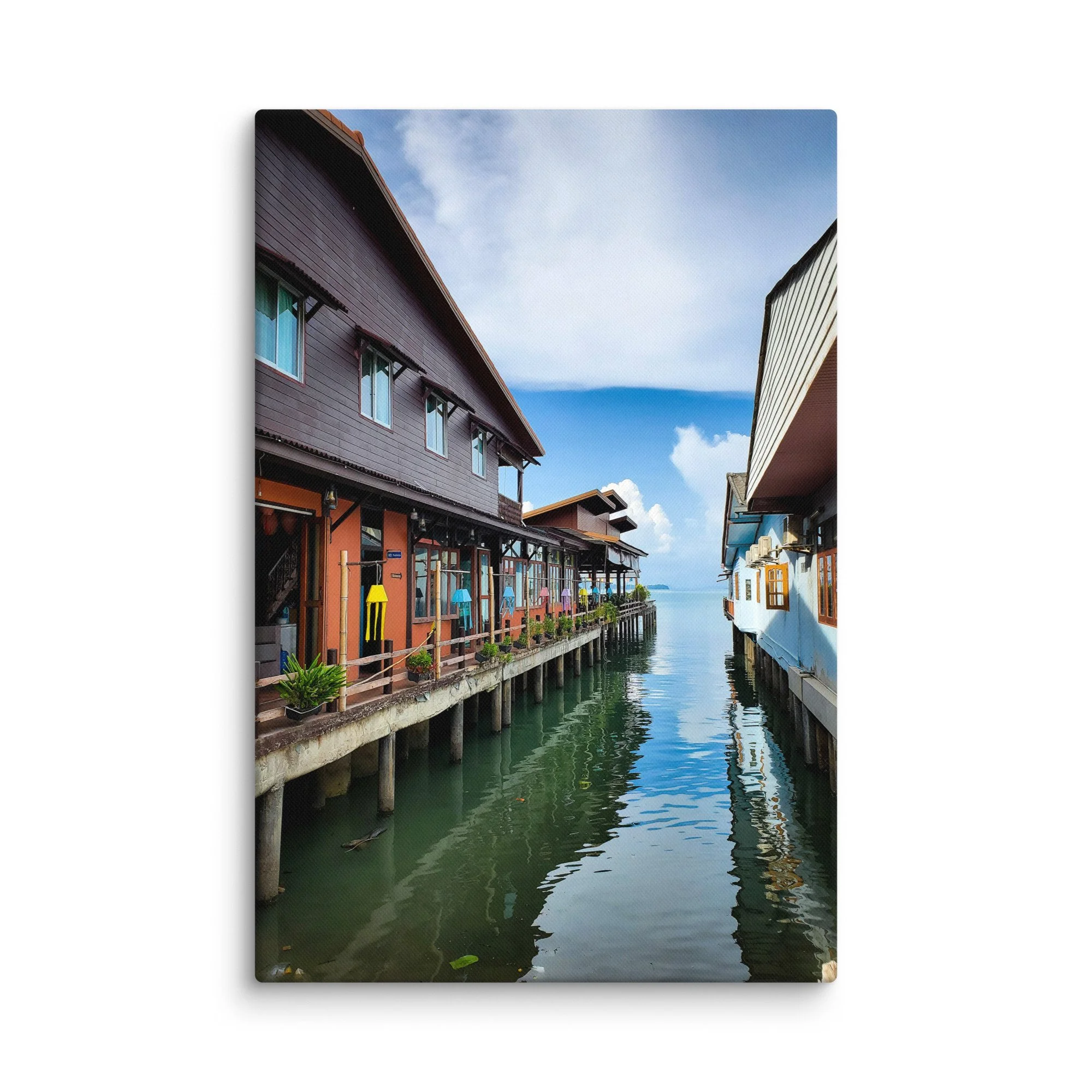 Serene Thai island pier with colorful longtail boats, gentle waves and green hills under cloudy sky – authentic Thailand travel photography canvas print wall art decor