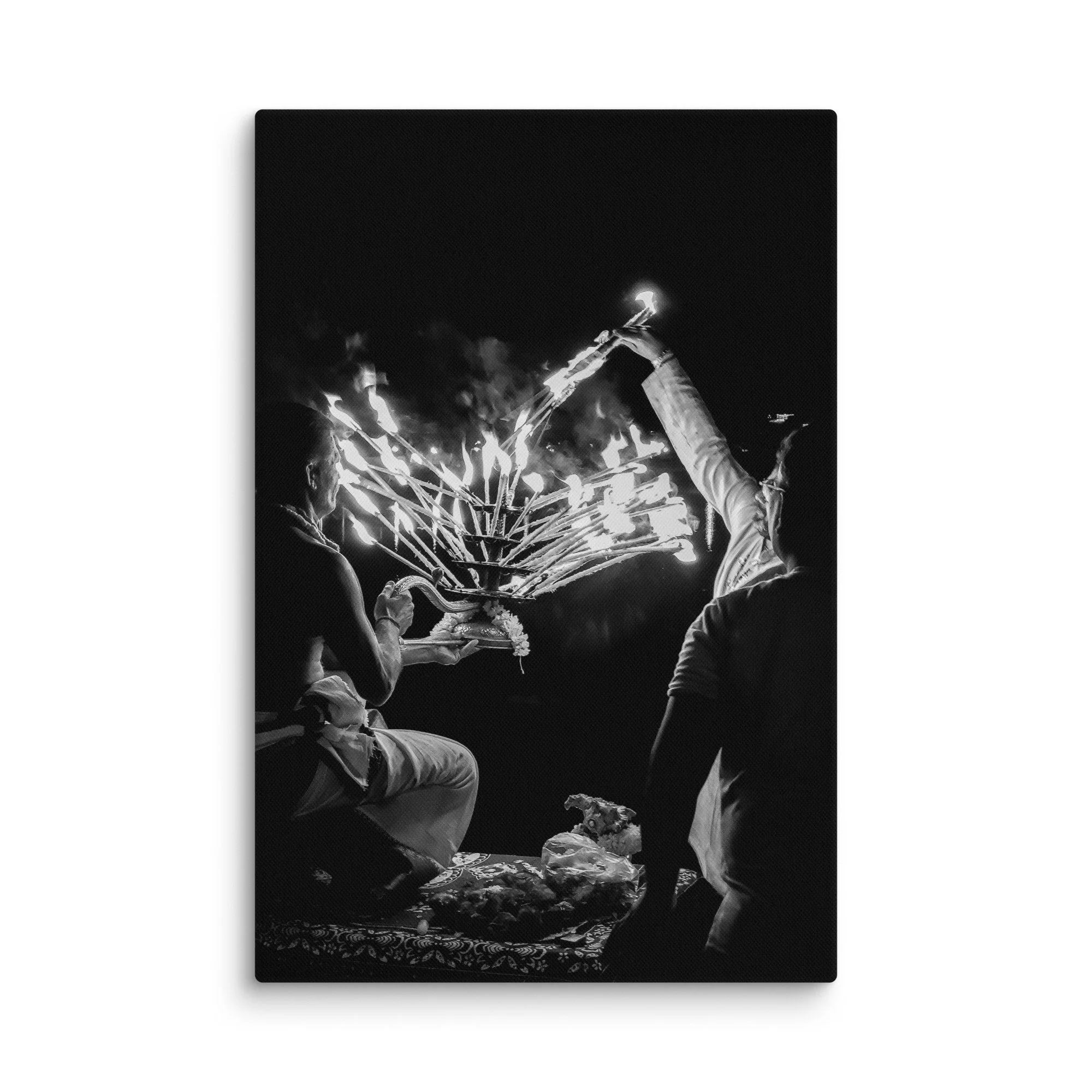 Black-and-white Varanasi Ganges Aarti with priest holding multi-flame lamp and incense smoke – sacred India spiritual travel photography canvas print wall art decor