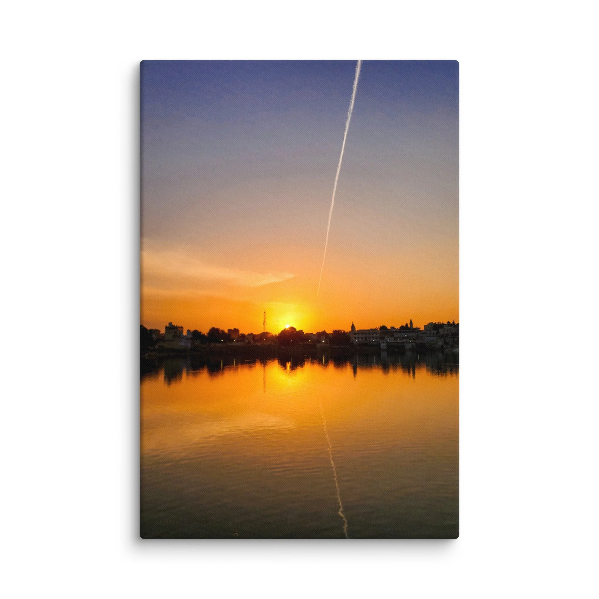 Serene sunset over Pushkar Lake with pilgrims on ghats, birds flying and warm orange sky reflection – sacred Rajasthan India travel photography canvas print wall art decor