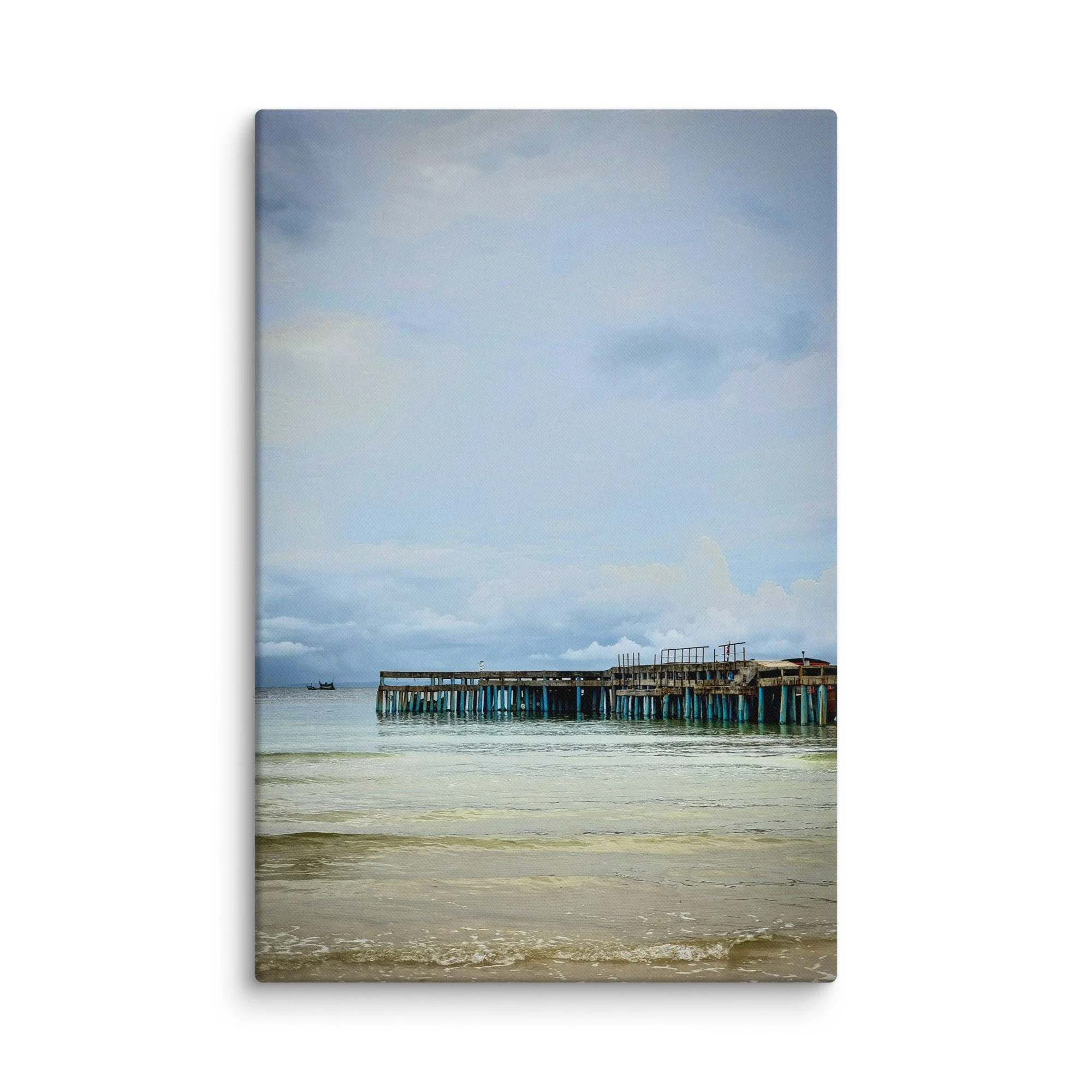 Serene weathered wooden pier on Thai island beach with calm waters, cloudy sky and distant boats – authentic Thailand travel photography canvas print wall art decor