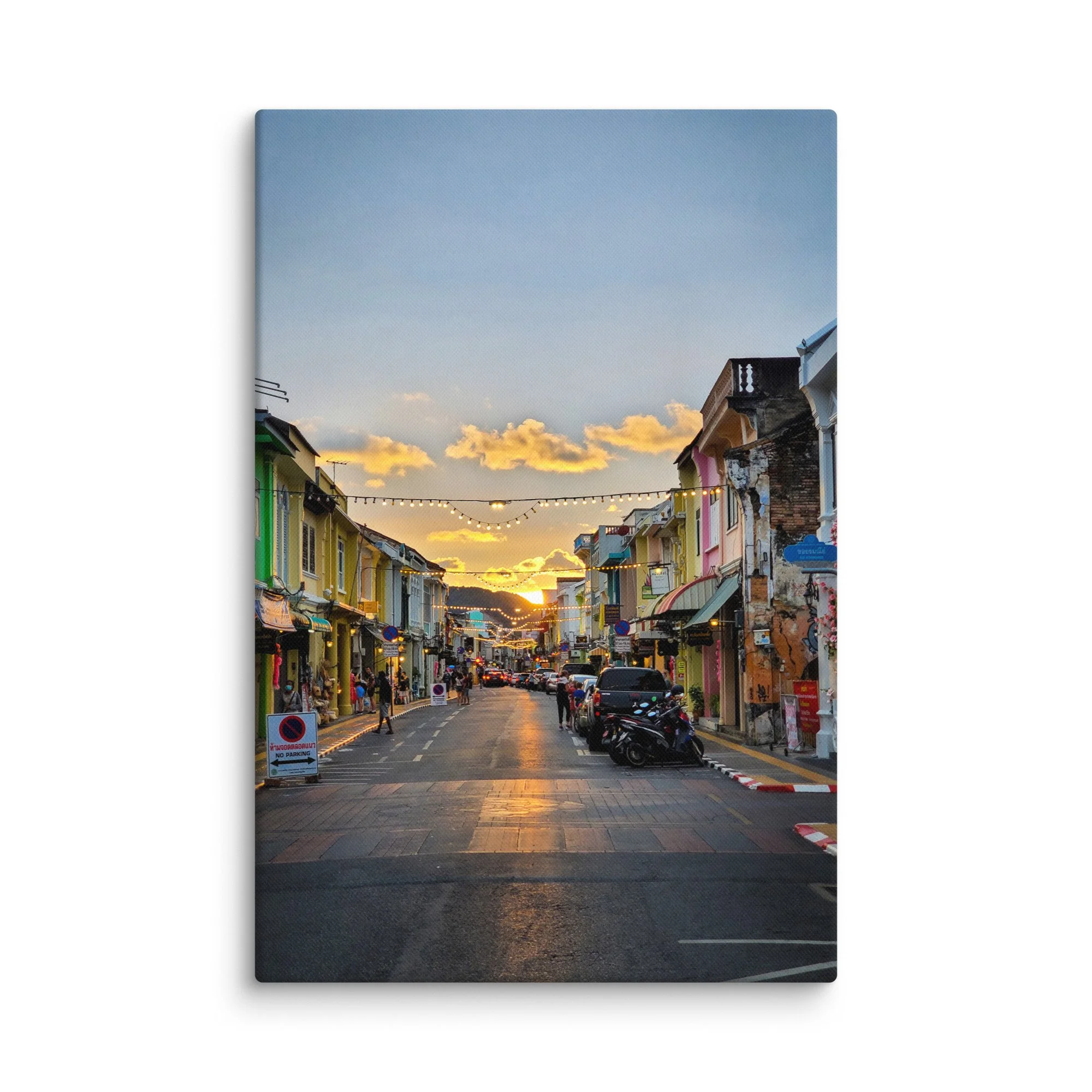 Golden sunset over colorful Sino-Portuguese street in Phuket Old Town with string lights, shophouses and hills – Thailand heritage travel photography canvas print wall art decor