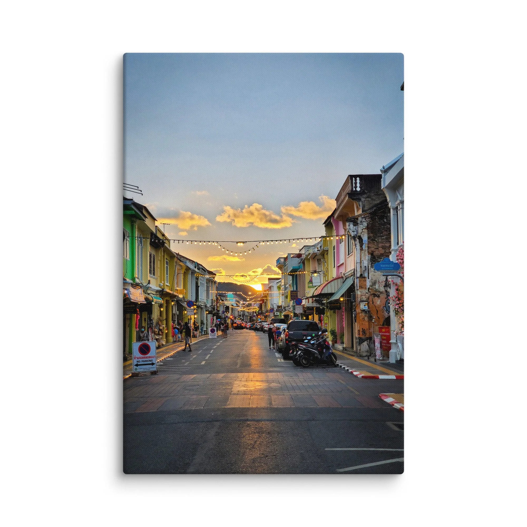 Golden sunset over colorful Sino-Portuguese street in Phuket Old Town with string lights, shophouses and hills – Thailand heritage travel photography canvas print wall art decor