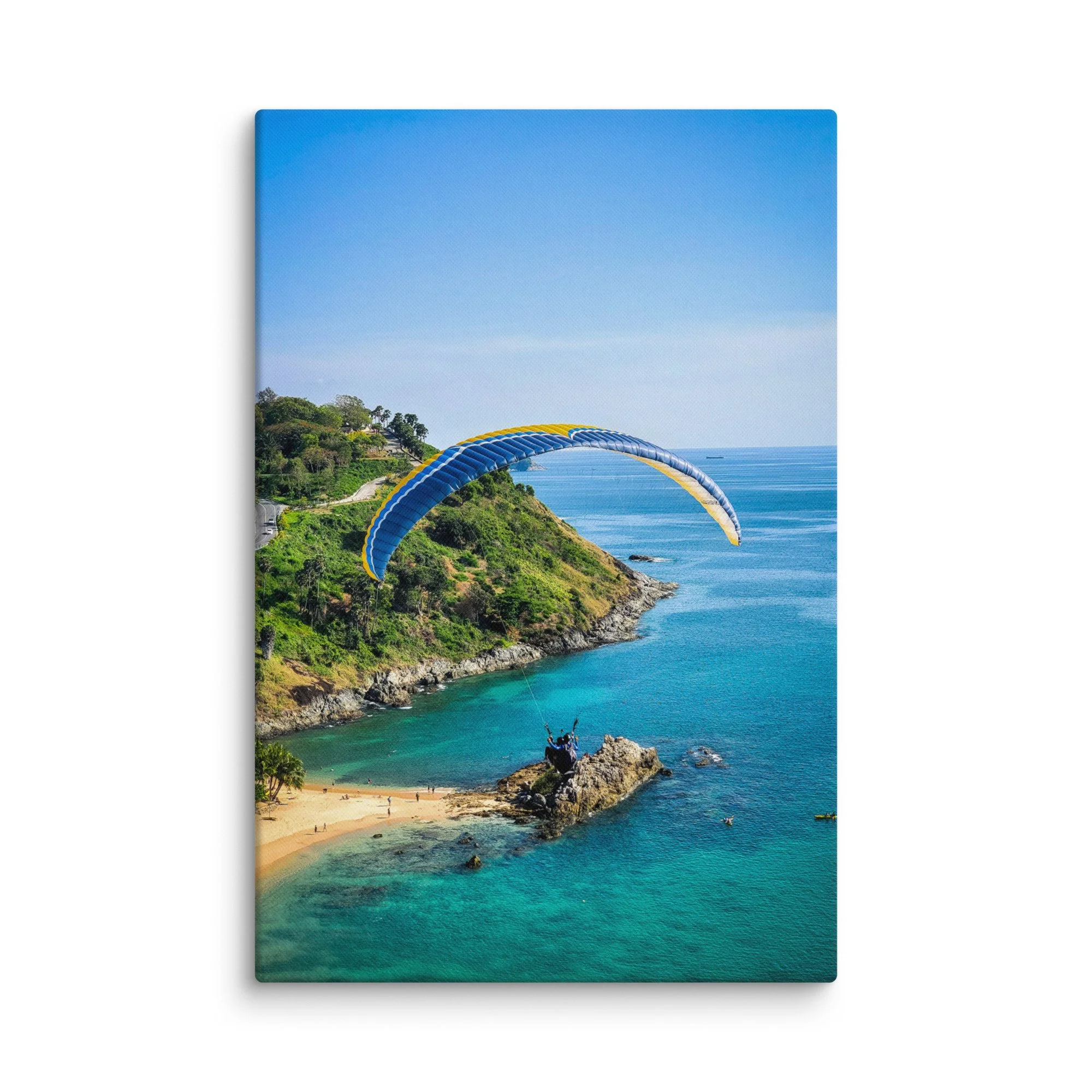 Paraglider soaring over turquoise cove and rugged coastline in Phuket, Thailand with blue sky – adventure travel photography canvas print wall art decor