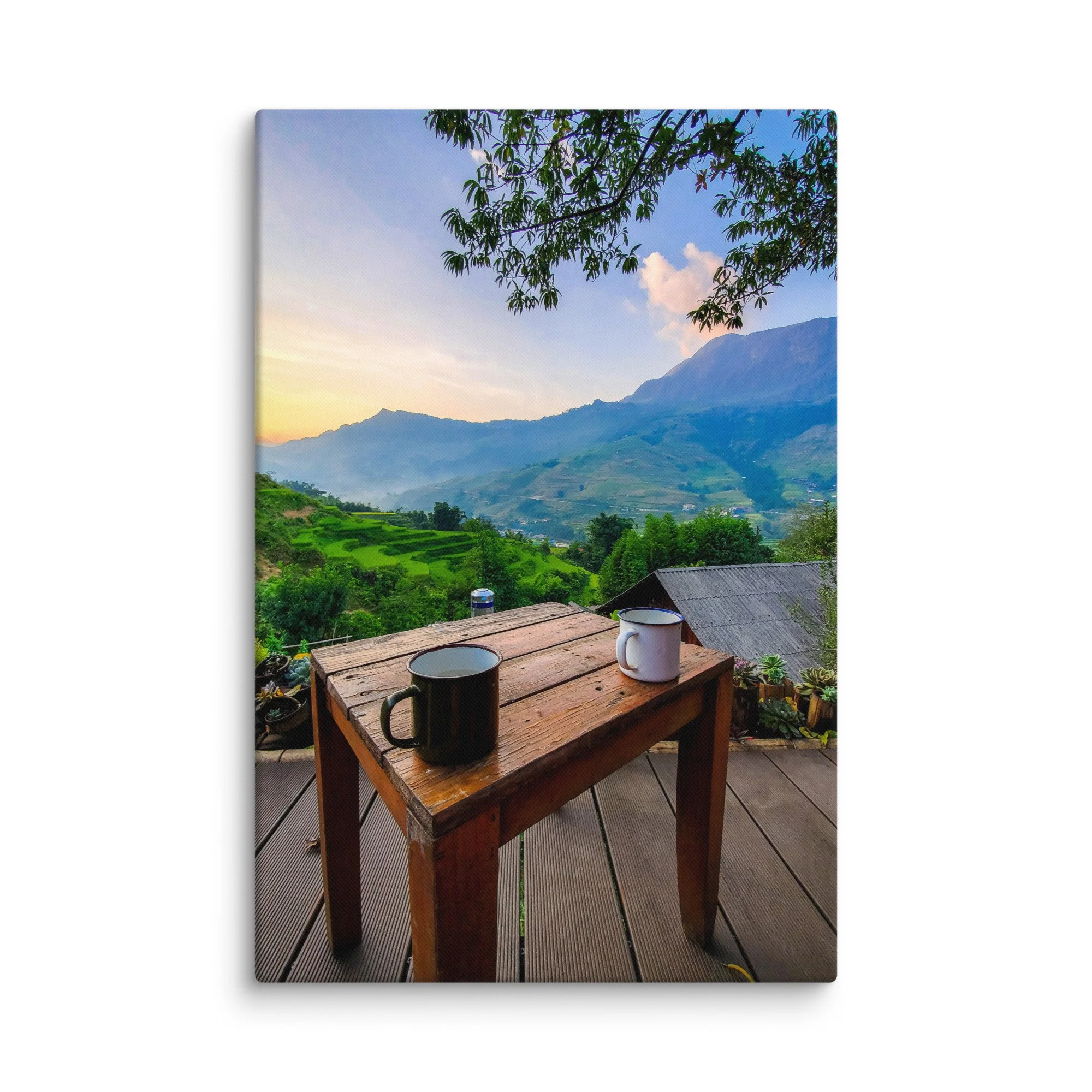 Enamel mug on wooden table overlooking misty rice terraces and mountains in Sapa, Vietnam at sunrise – northern highland travel photography canvas print wall art decor
