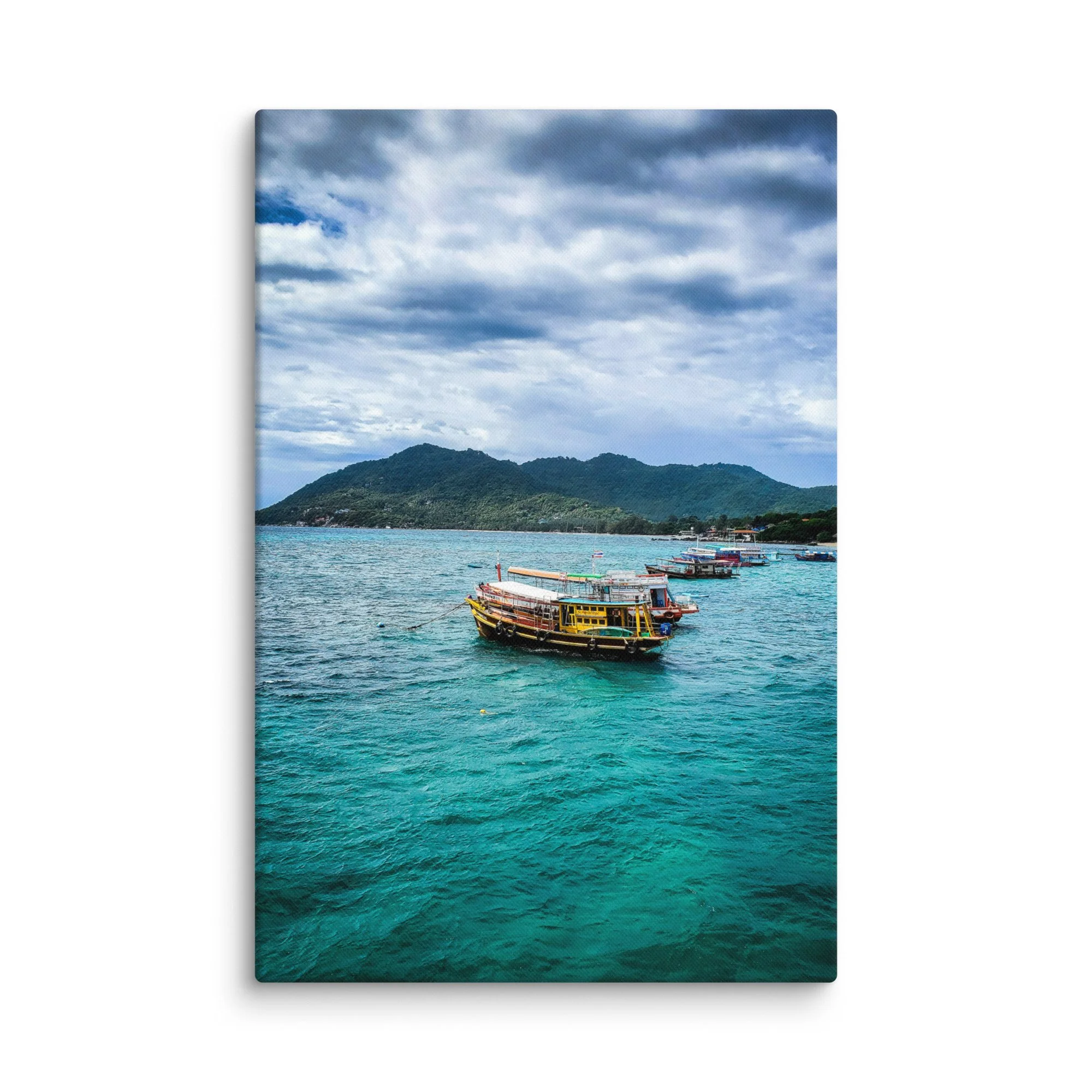 Colorful longtail boats moored in crystal-clear turquoise water with green hills and cloudy sky in Thailand – tropical travel photography canvas print wall art decor