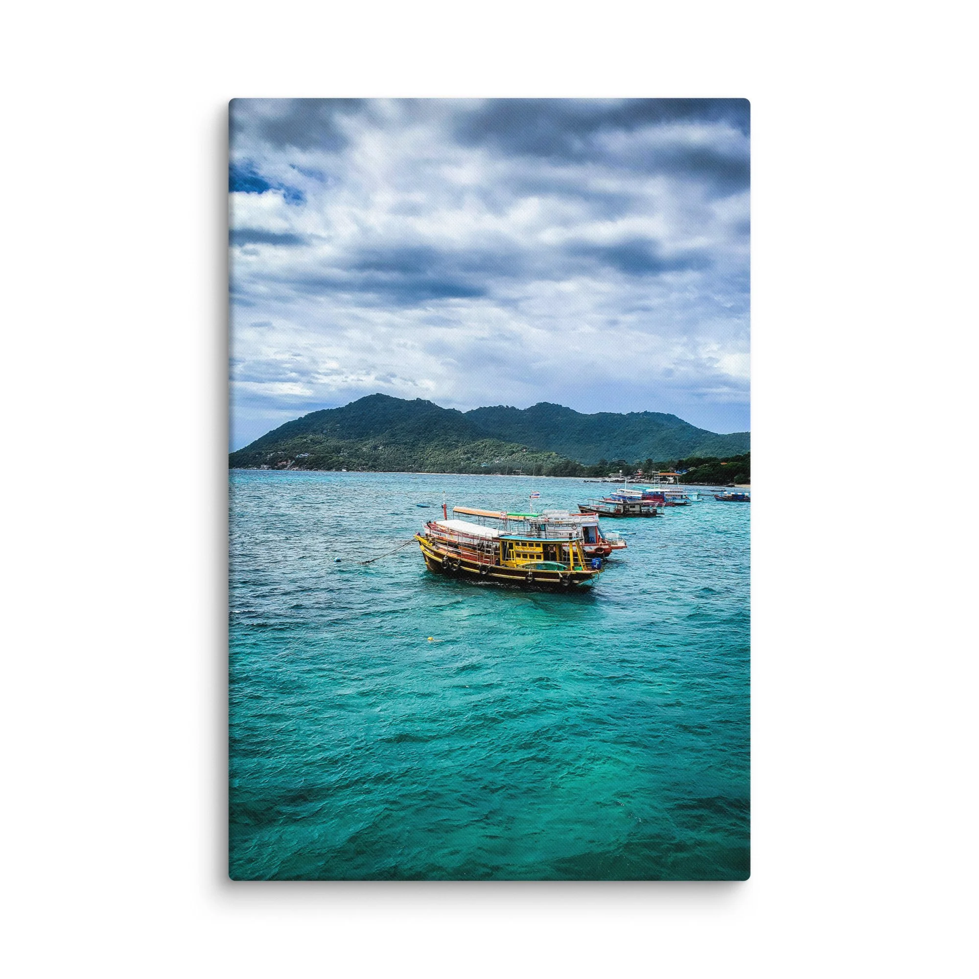 Colorful longtail boats moored in crystal-clear turquoise water with green hills and cloudy sky in Thailand – tropical travel photography canvas print wall art decor