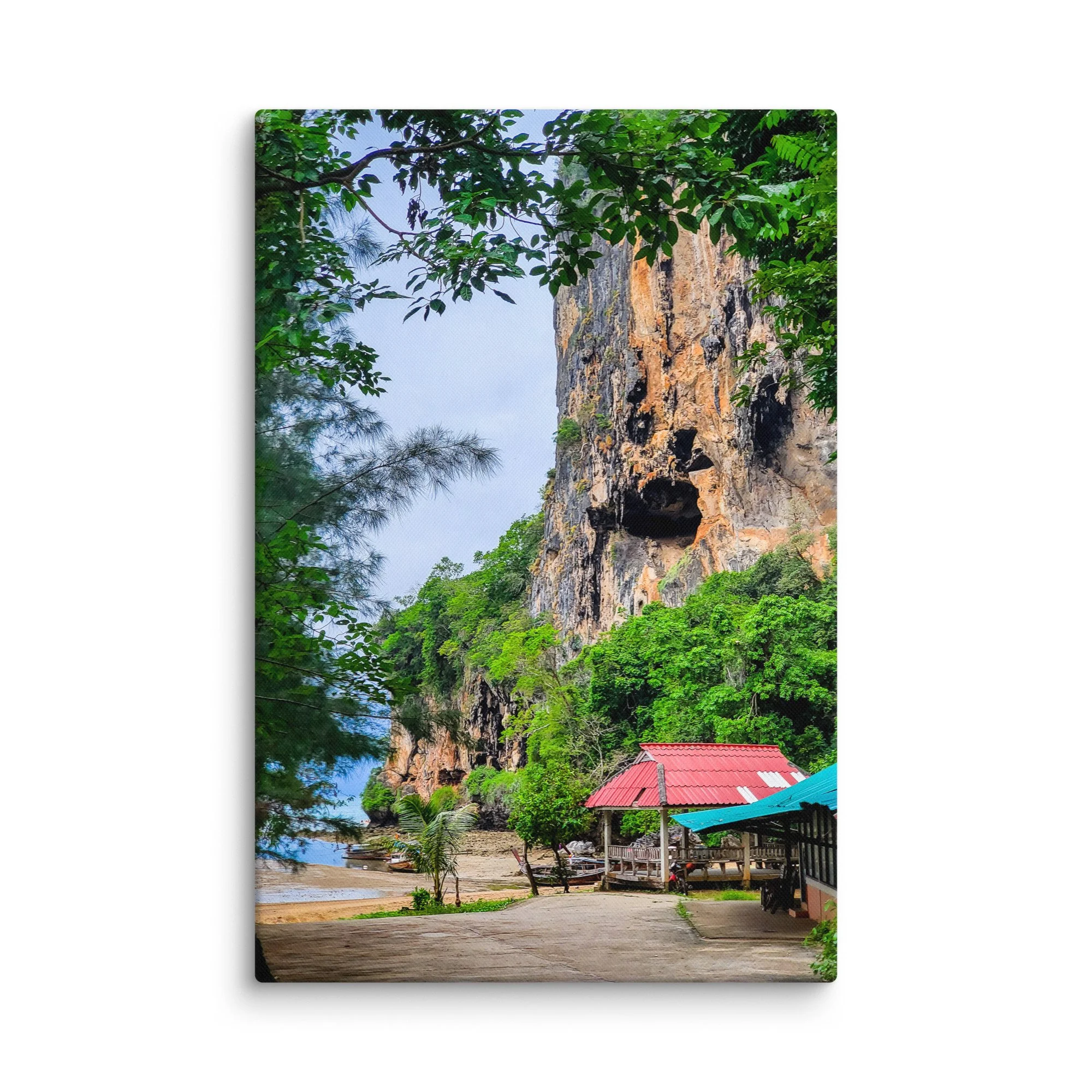 Dramatic limestone cliff and lush greenery overlooking Tonsai Beach, Krabi, Thailand with turquoise water and longtail boats – tropical travel photography canvas print wall art decor