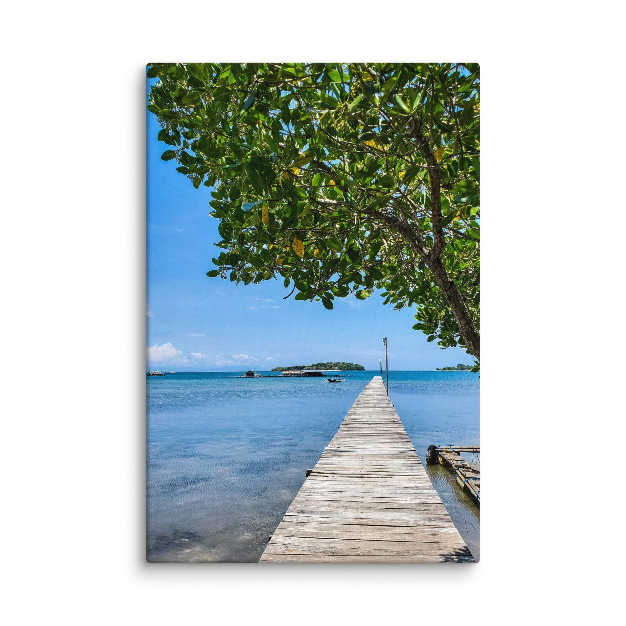 Serene wooden pier extending into turquoise waters with overhanging foliage and distant islands in Thailand – tropical travel photography canvas print wall art decor