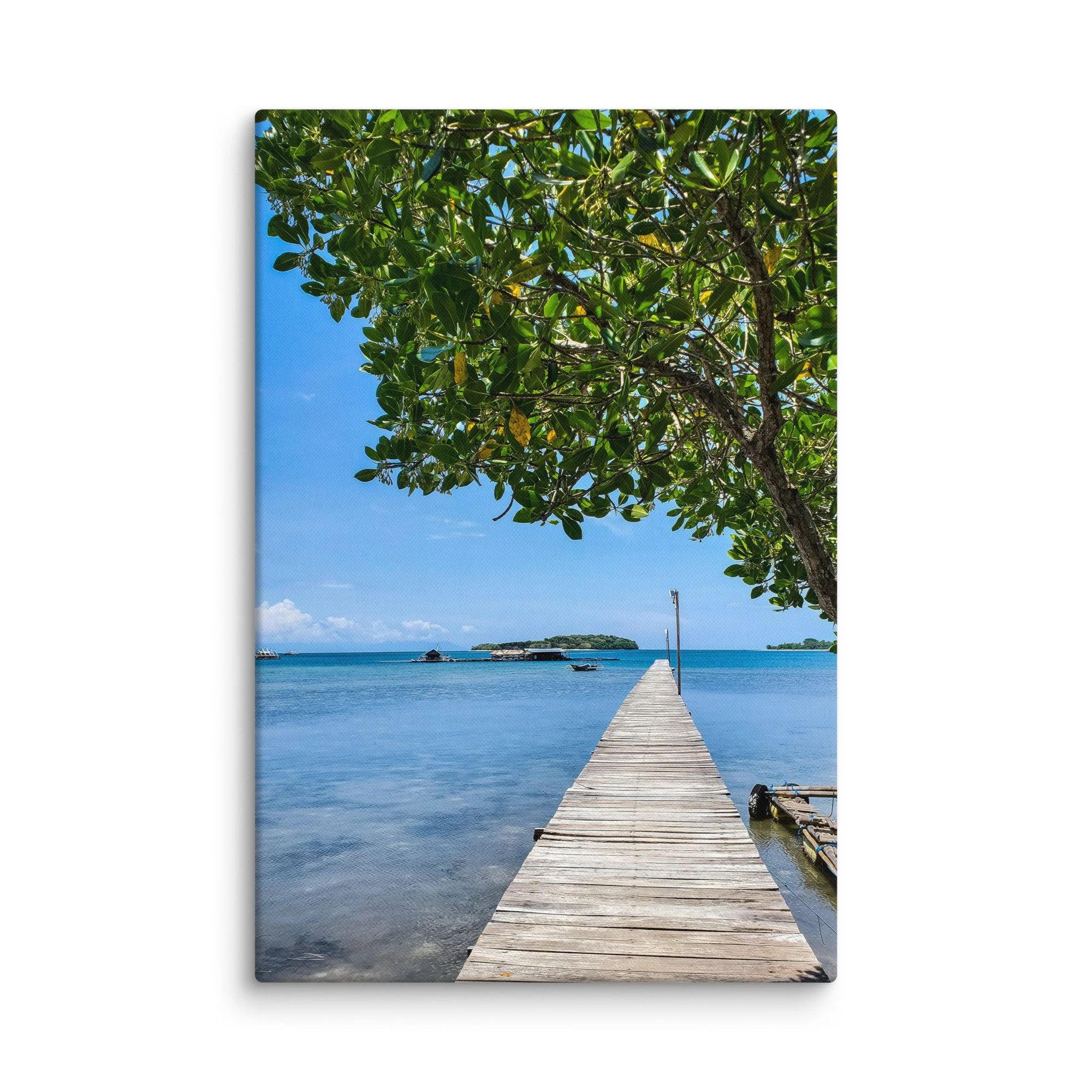 Serene wooden pier extending into turquoise waters with overhanging foliage and distant islands in Thailand – tropical travel photography canvas print wall art decor