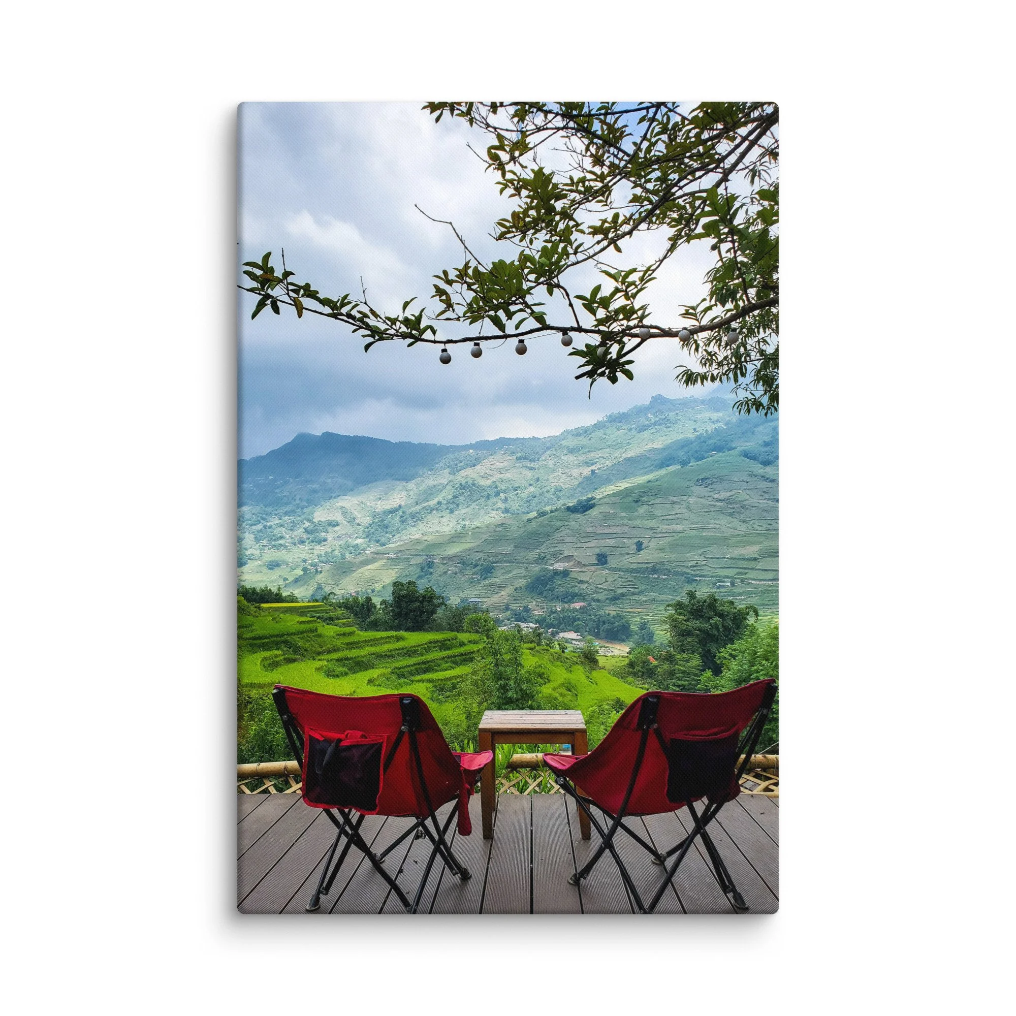 Red folding chairs on wooden balcony overlooking misty rice terraces and mountains in Sapa, Vietnam at sunset – northern highland travel photography canvas print wall art decor