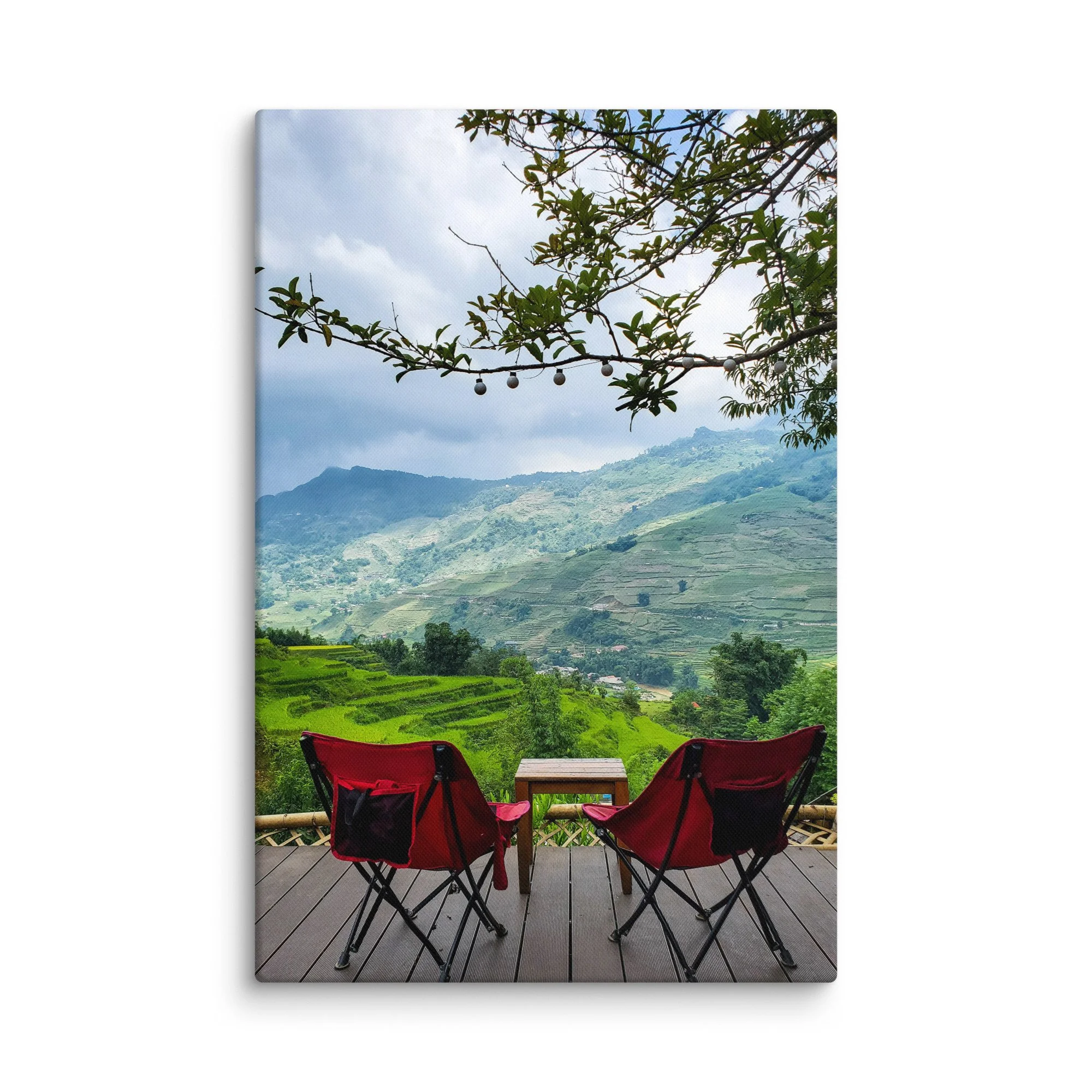 Red folding chairs on wooden balcony overlooking misty rice terraces and mountains in Sapa, Vietnam at sunset – northern highland travel photography canvas print wall art decor