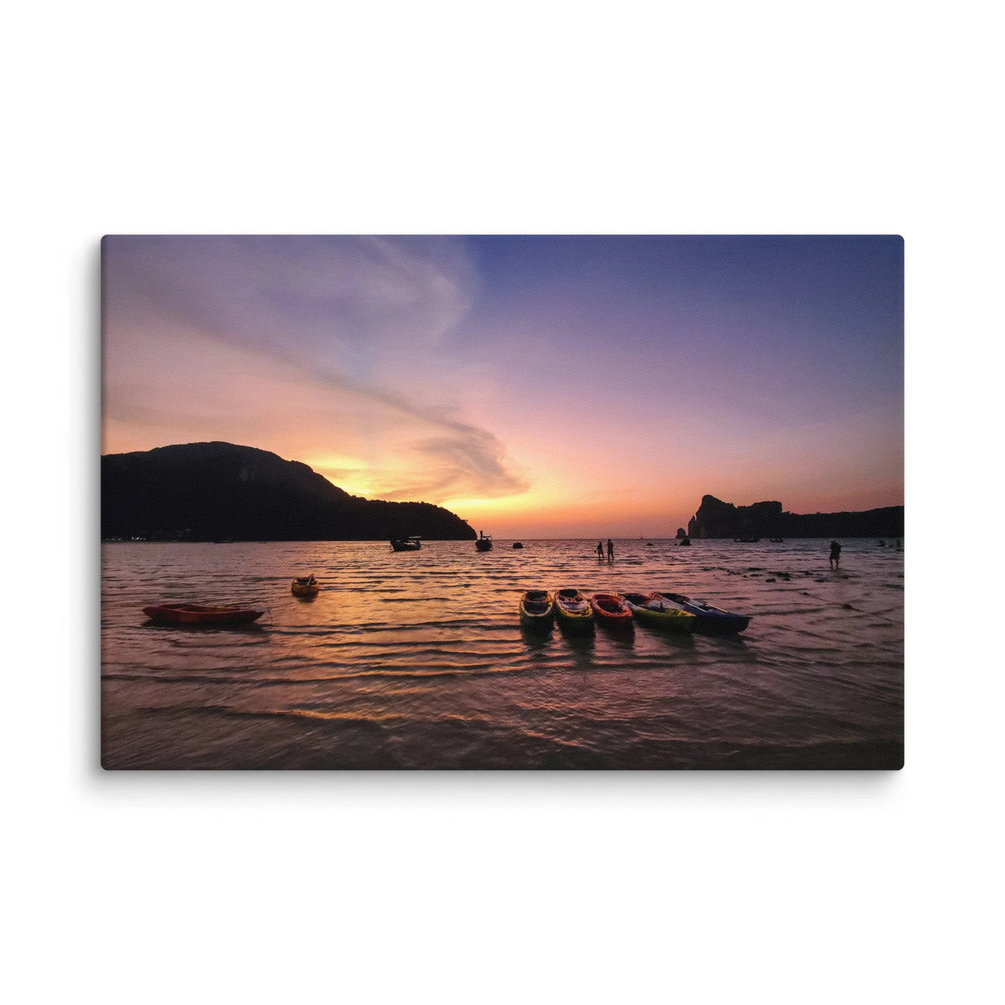 Colorful kayaks and longtail boats at sunset in Phi Phi Islands, Thailand with purple-pink sky and calm sea – tropical travel photography canvas print wall art decor