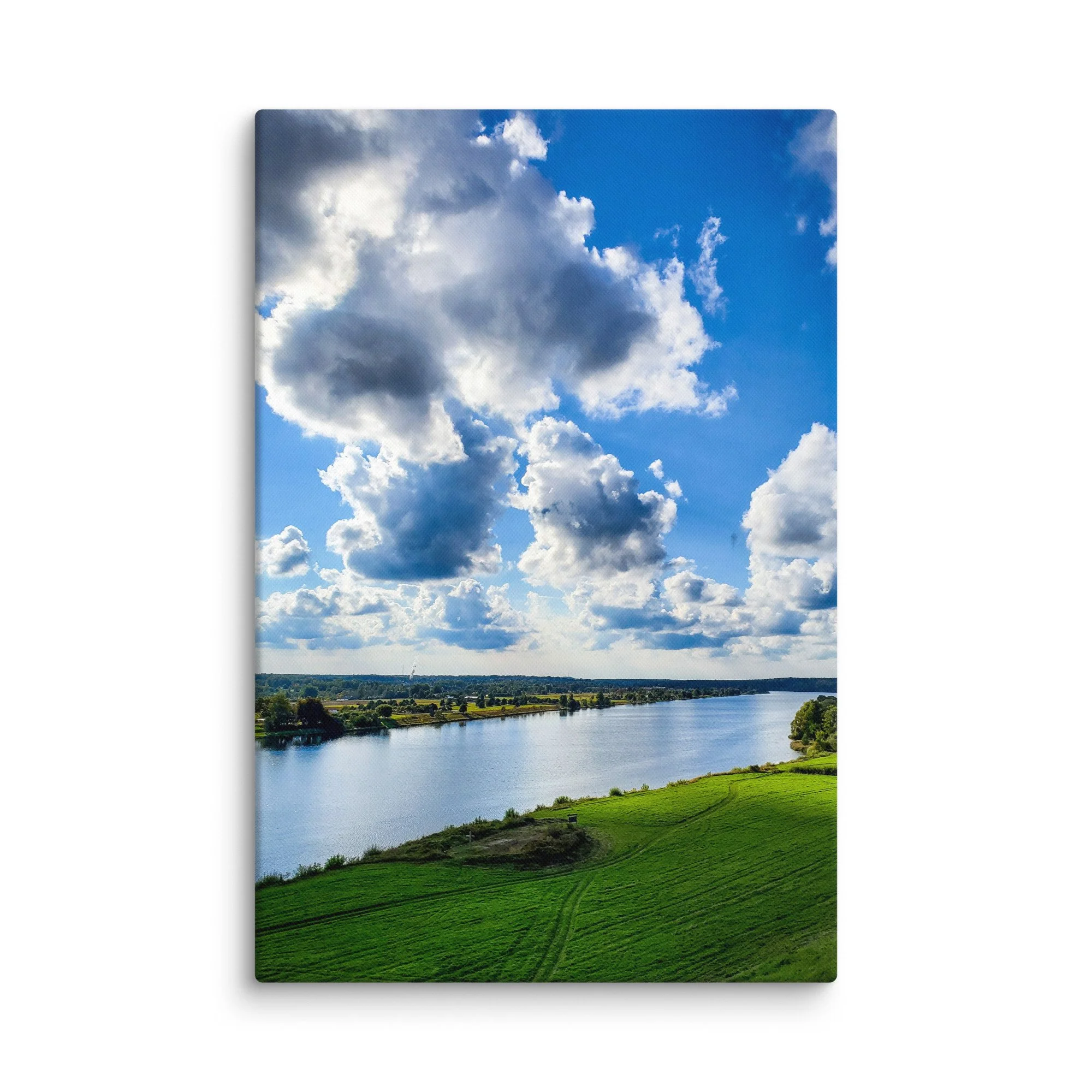 Panoramic view over the wide Daugava River valley in Latvia with green fields, distant forest and dramatic cloudy sky – countryside travel photography canvas print wall art decor