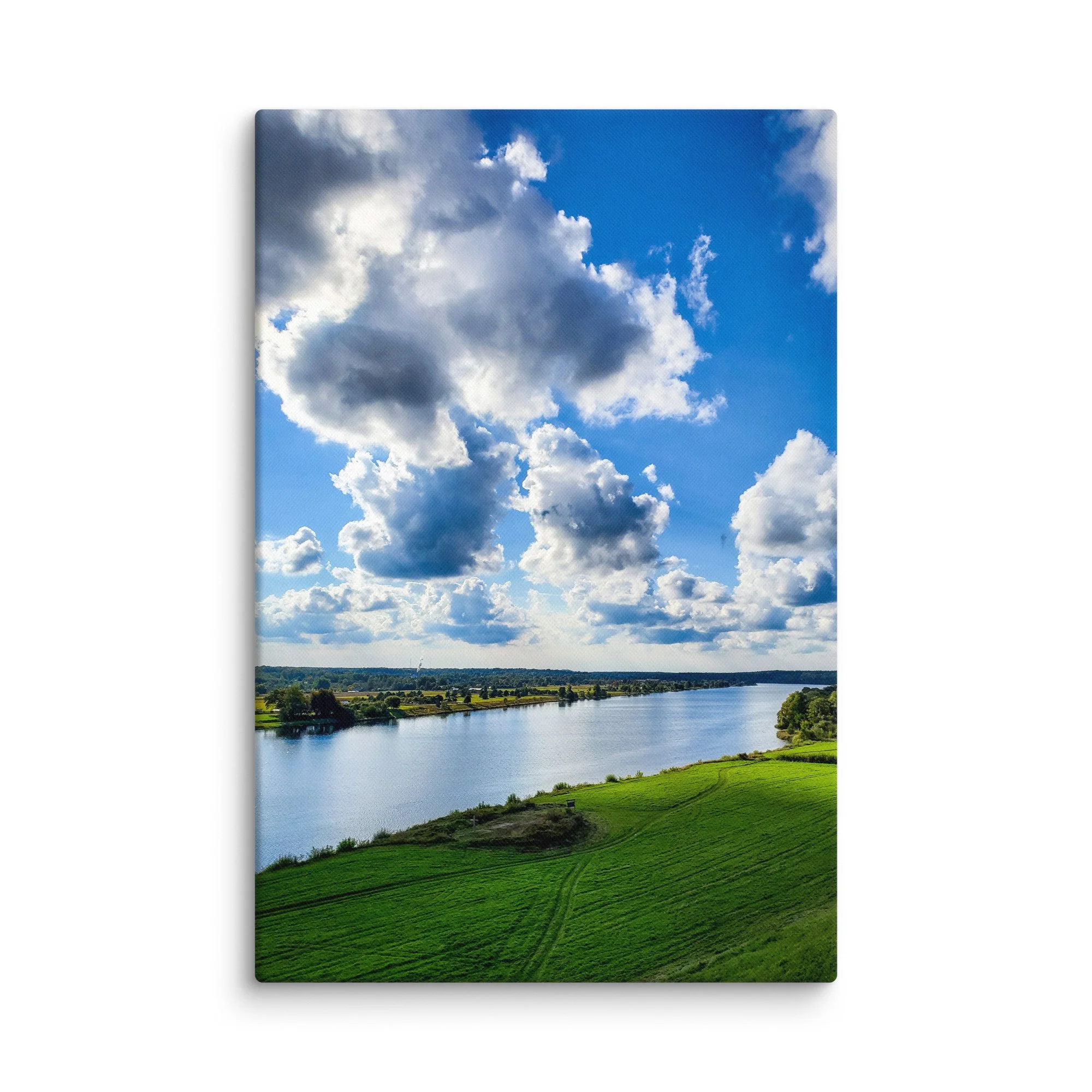 Panoramic view over the wide Daugava River valley in Latvia with green fields, distant forest and dramatic cloudy sky – countryside travel photography canvas print wall art decor