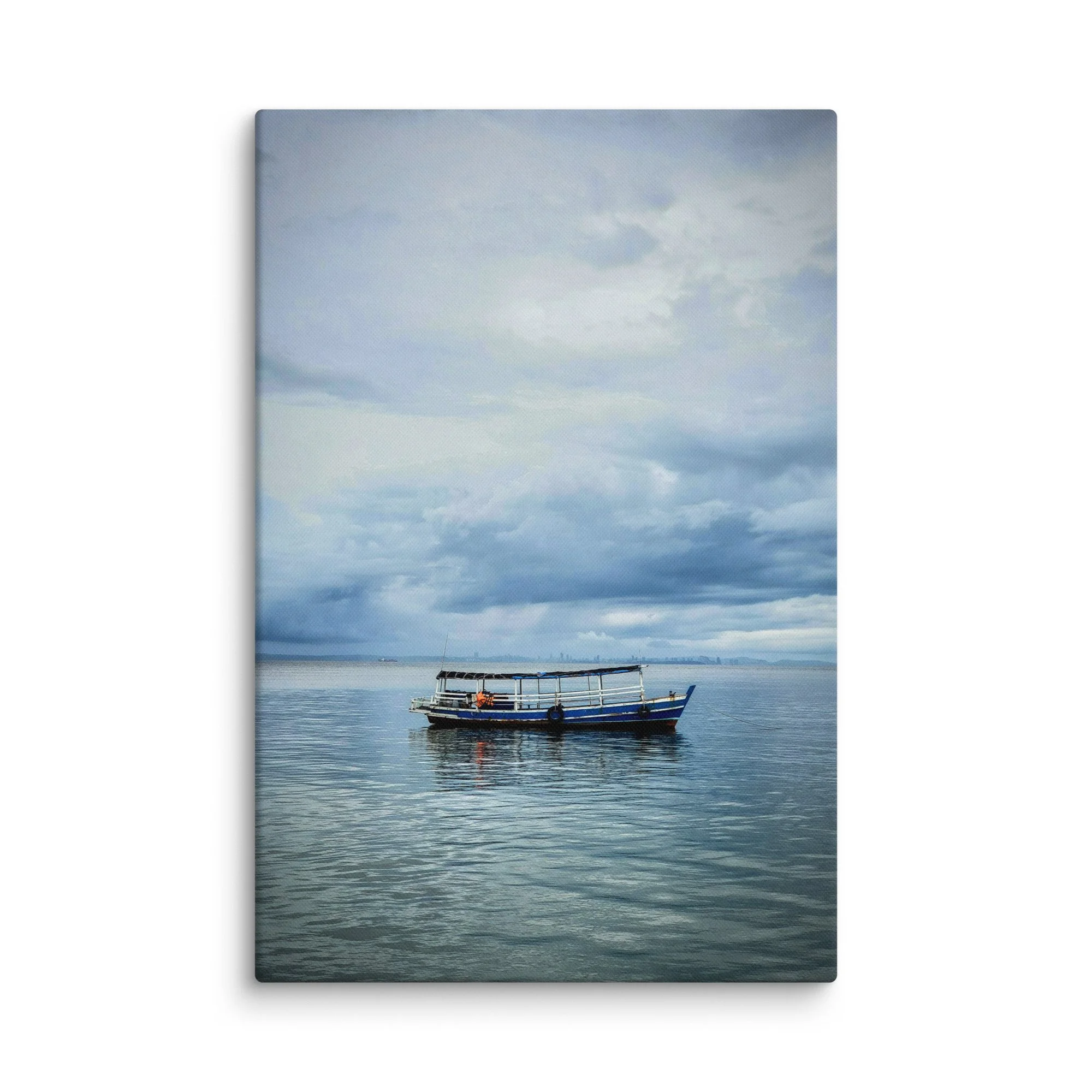 Classic blue-and-white wooden boat floating on calm sea under dramatic cloudy sky in Thailand – tropical travel photography canvas print wall art decor