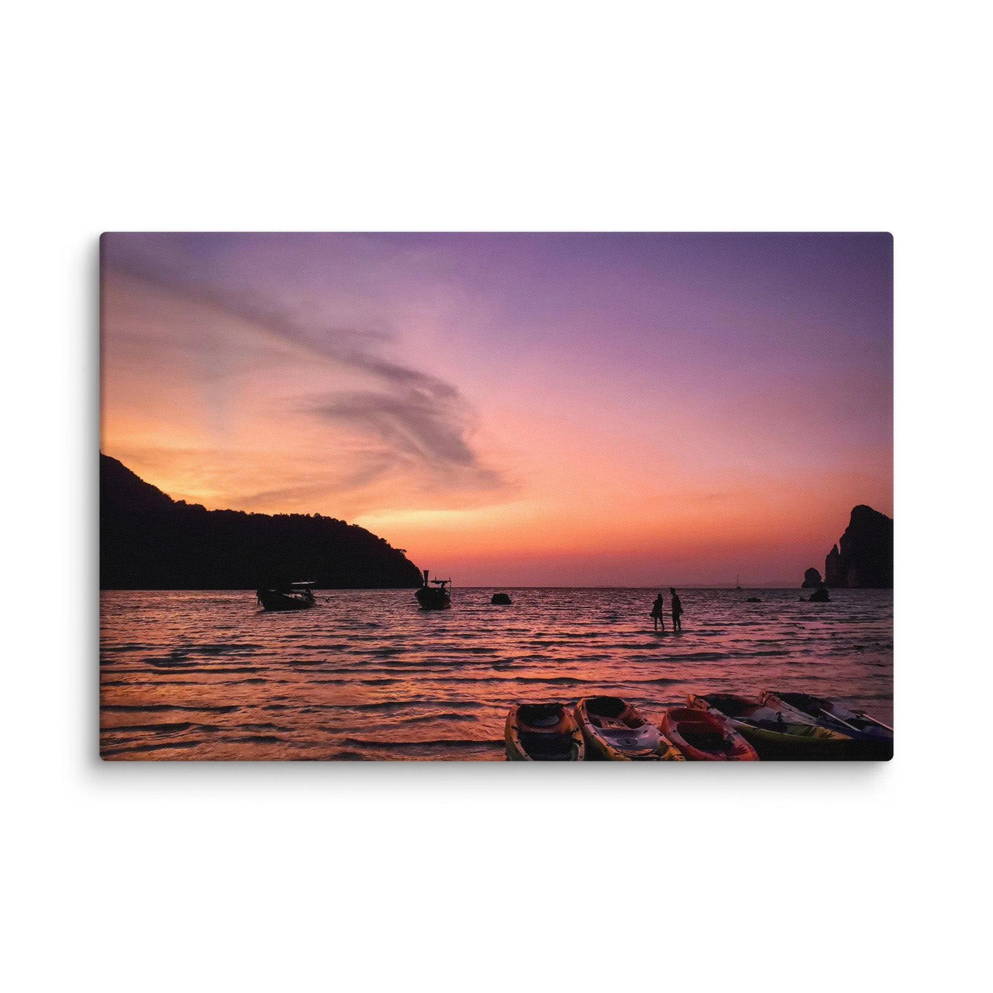 Sunset over shallow turquoise waters with colorful kayaks, longtail boats and limestone karst formations at Phi Phi Islands, Thailand – tropical travel photography canvas print wall art decor