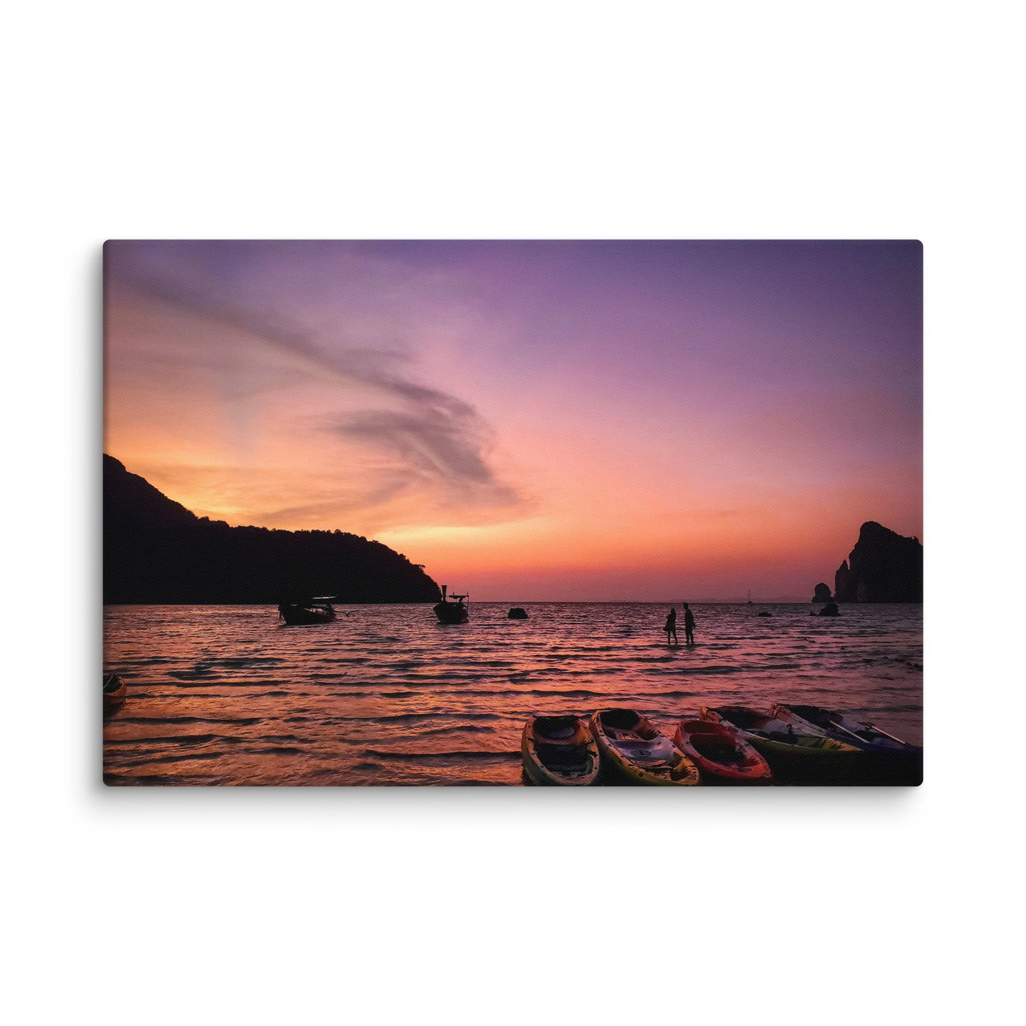 Sunset over shallow turquoise waters with colorful kayaks, longtail boats and limestone karst formations at Phi Phi Islands, Thailand – tropical travel photography canvas print wall art decor