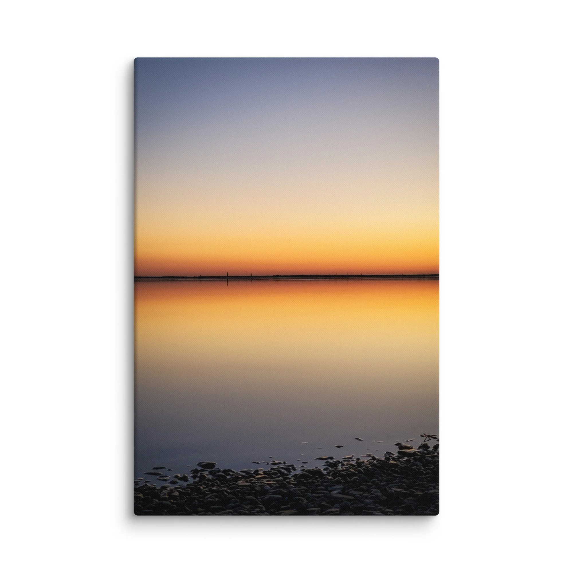Smooth pebble beach reflecting soft sunset gradient sky over calm Baltic waters in Latvia – Nordic travel photography canvas print wall art decor