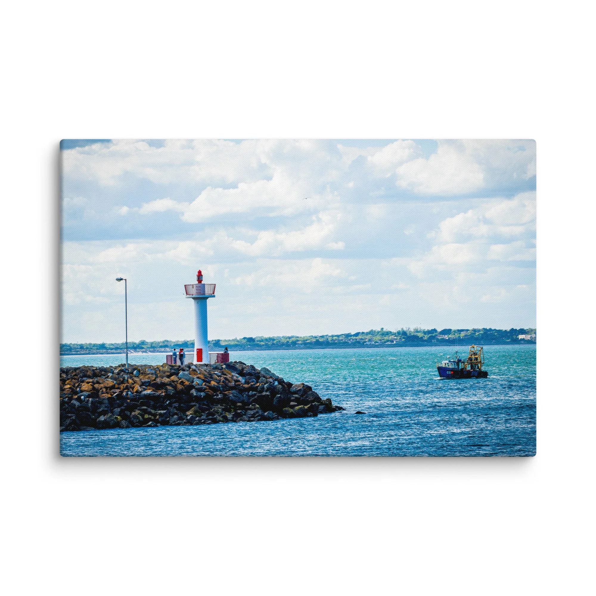 Iconic white-and-red lighthouse on stone pier with fishing trawler and calm blue waters in Howth, Ireland under bright sky – Celtic coastal travel photography canvas print wall art decor
