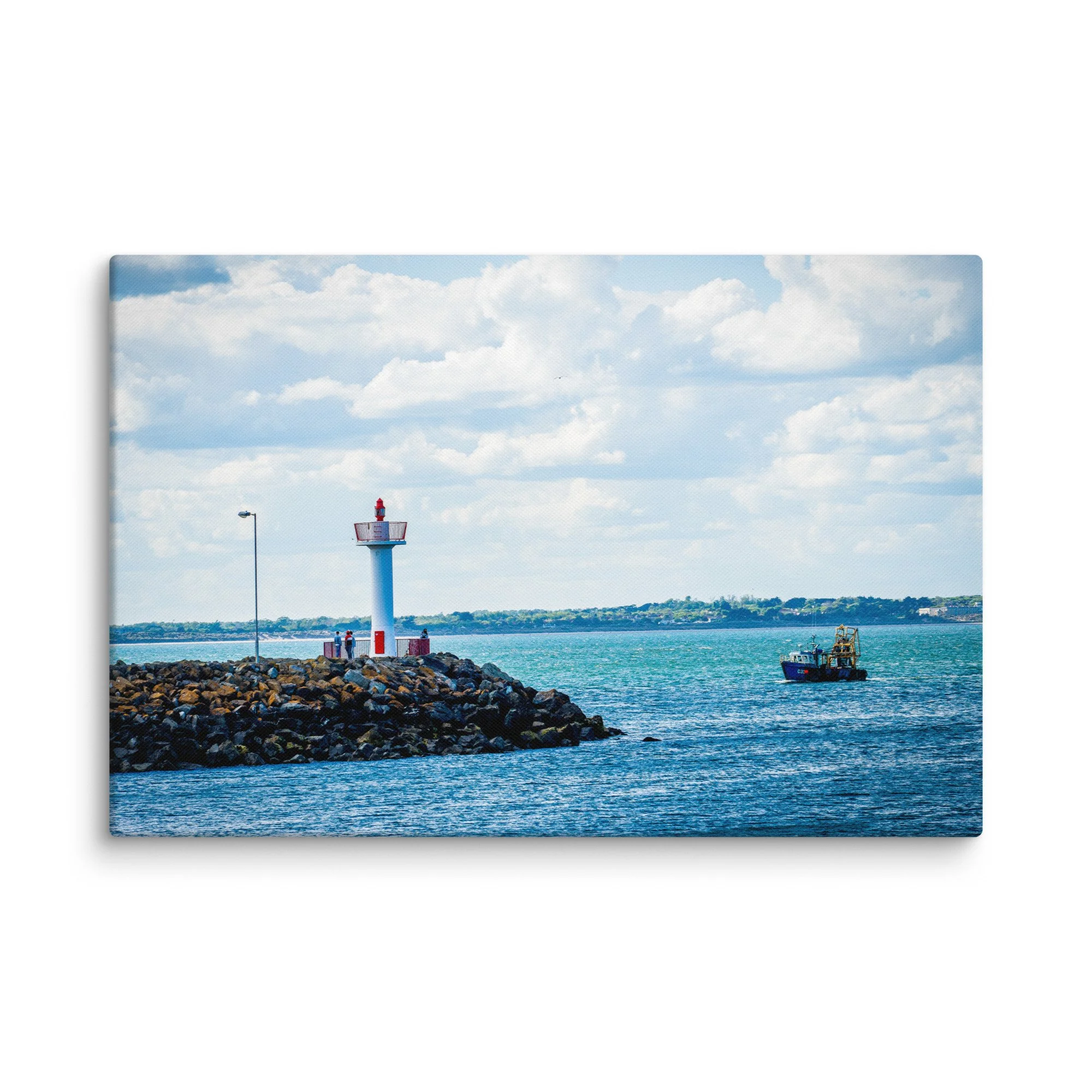 Iconic white-and-red lighthouse on stone pier with fishing trawler and calm blue waters in Howth, Ireland under bright sky – Celtic coastal travel photography canvas print wall art decor