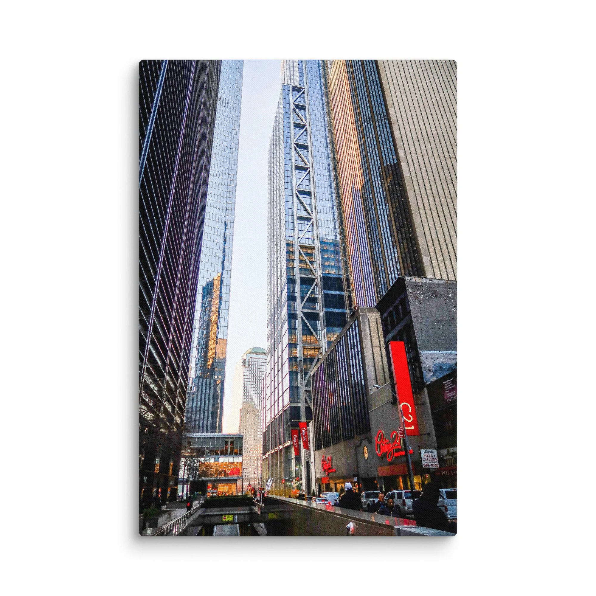 Dramatic upward view of towering skyscrapers in Wall Street, New York City, with golden light and blue sky – urban travel photography canvas print wall art decor