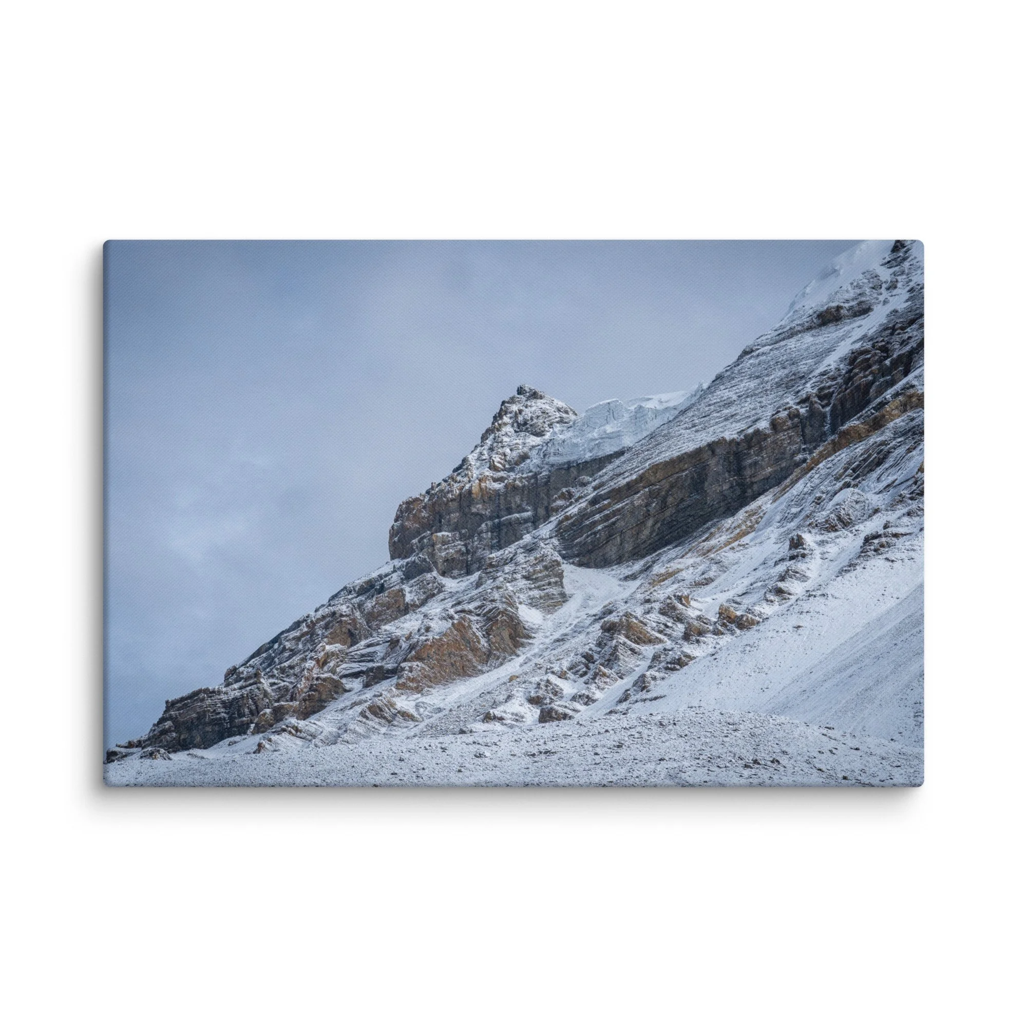 Snow-covered high ridge on the Annapurna Circuit, Nepal with dramatic Himalayan peaks and moody sky – trekking travel photography canvas print wall art decor