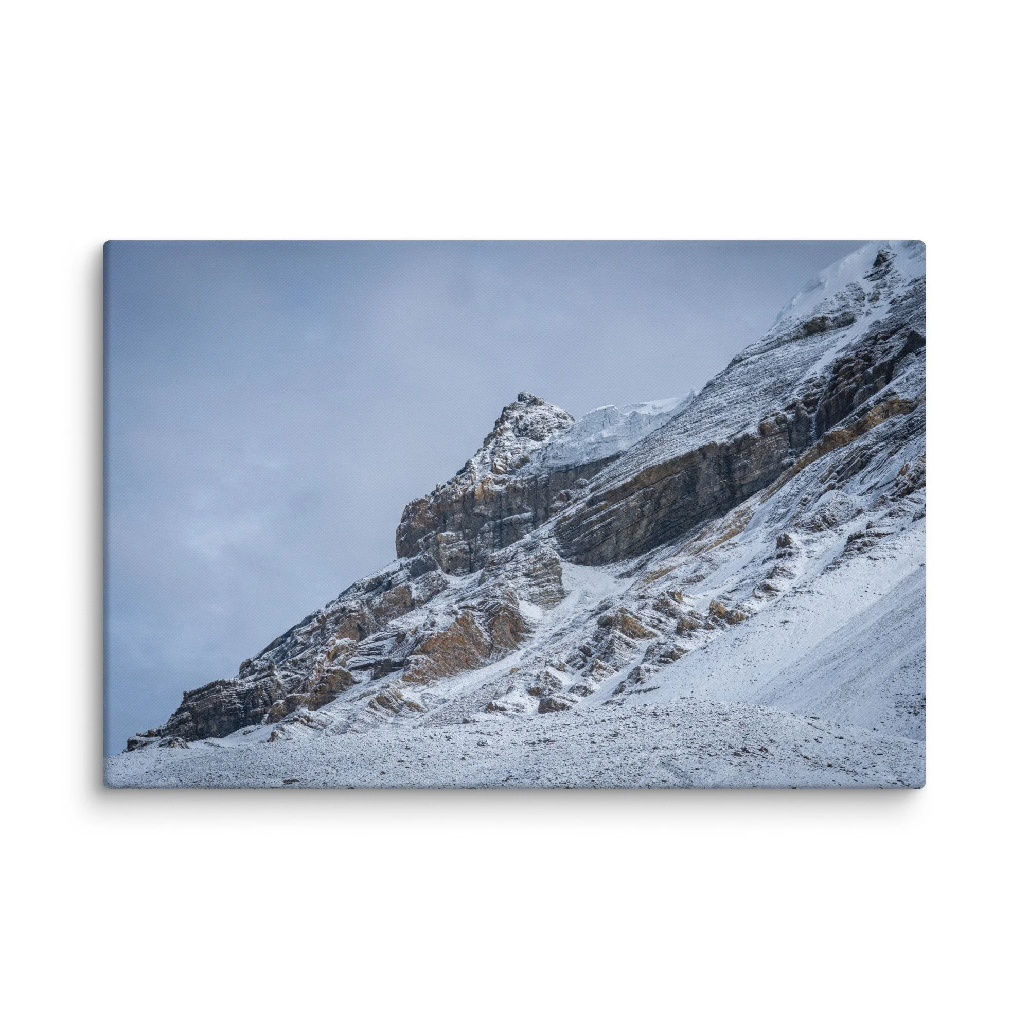 Snow-covered high ridge on the Annapurna Circuit, Nepal with dramatic Himalayan peaks and moody sky – trekking travel photography canvas print wall art decor