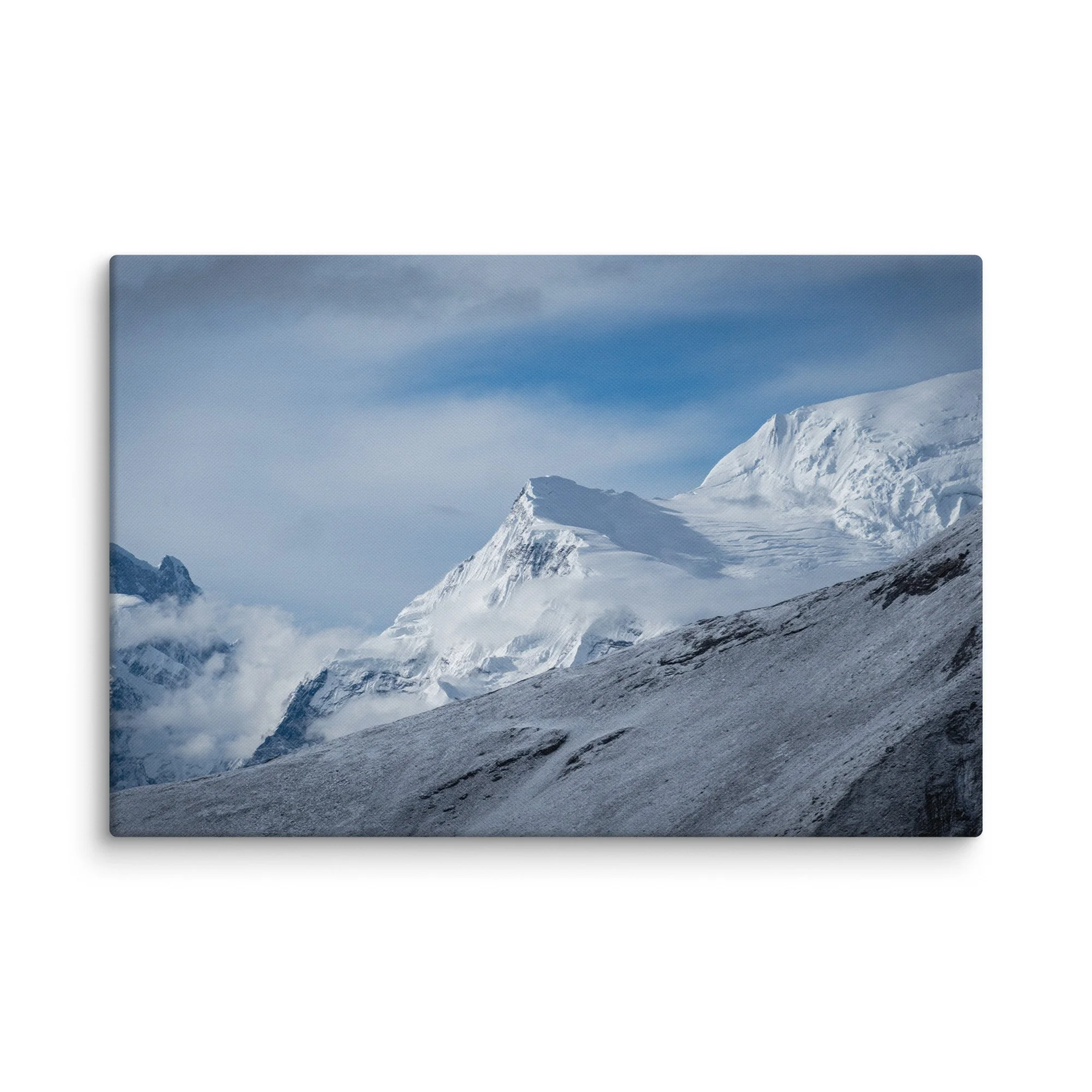 Snow-covered high ridge on the Annapurna Circuit, Nepal with dramatic Himalayan peaks and moody sky – trekking travel photography canvas print wall art decor