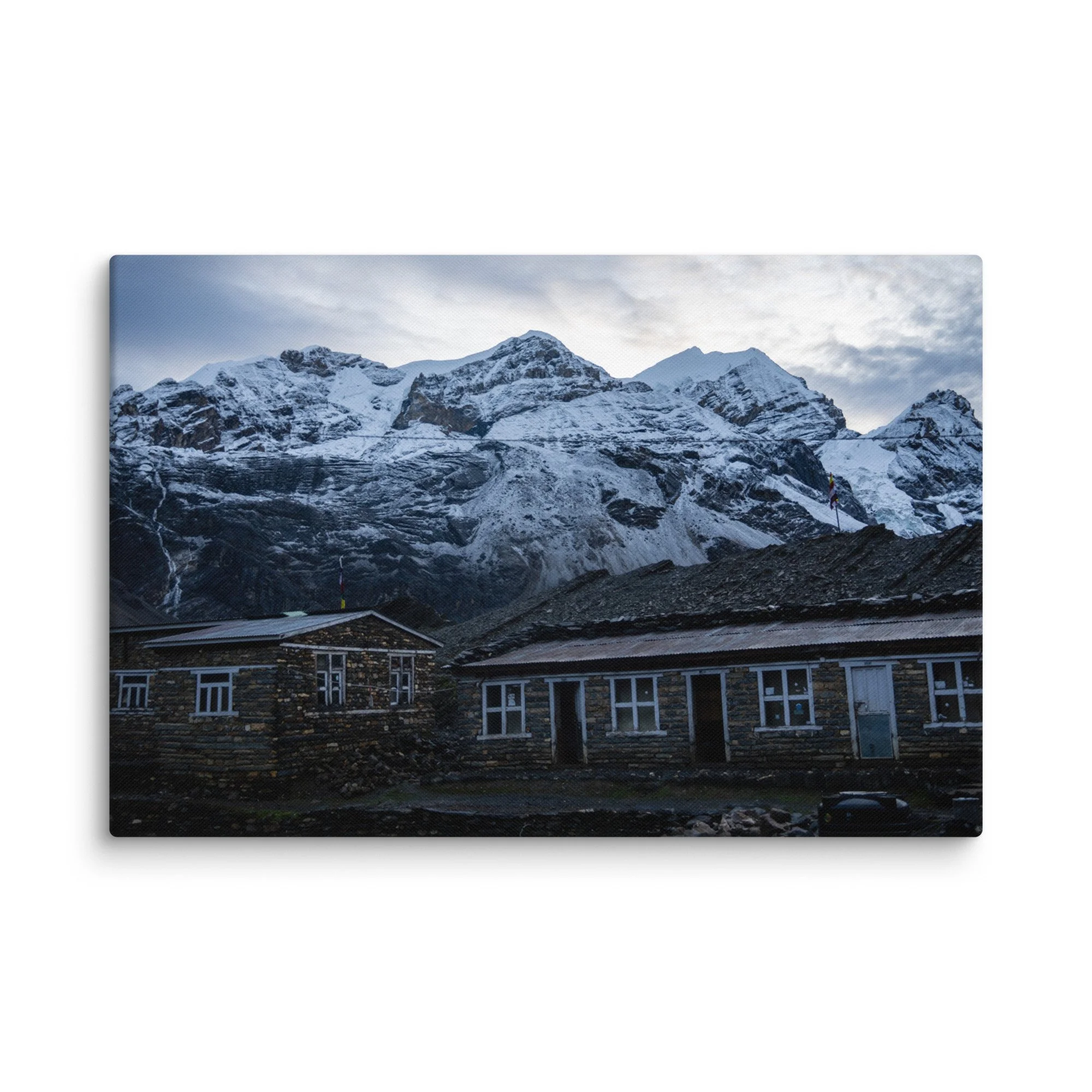 Snow-covered high ridge on the Annapurna Circuit, Nepal with dramatic Himalayan peaks and moody sky – trekking travel photography canvas print wall art decor