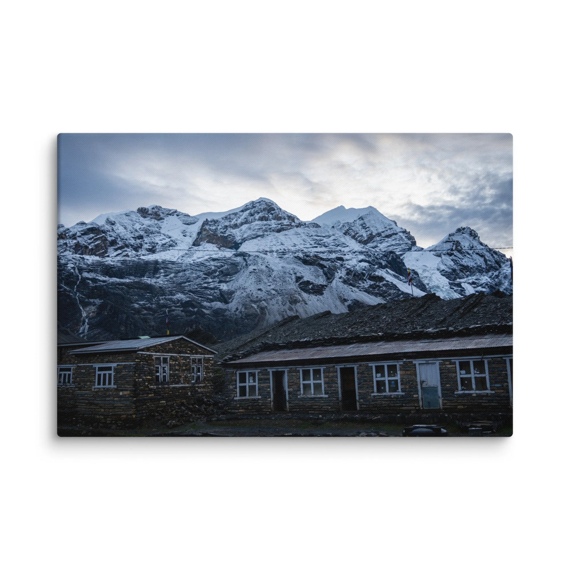 Snow-covered high ridge on the Annapurna Circuit, Nepal with dramatic Himalayan peaks and moody sky – trekking travel photography canvas print wall art decor