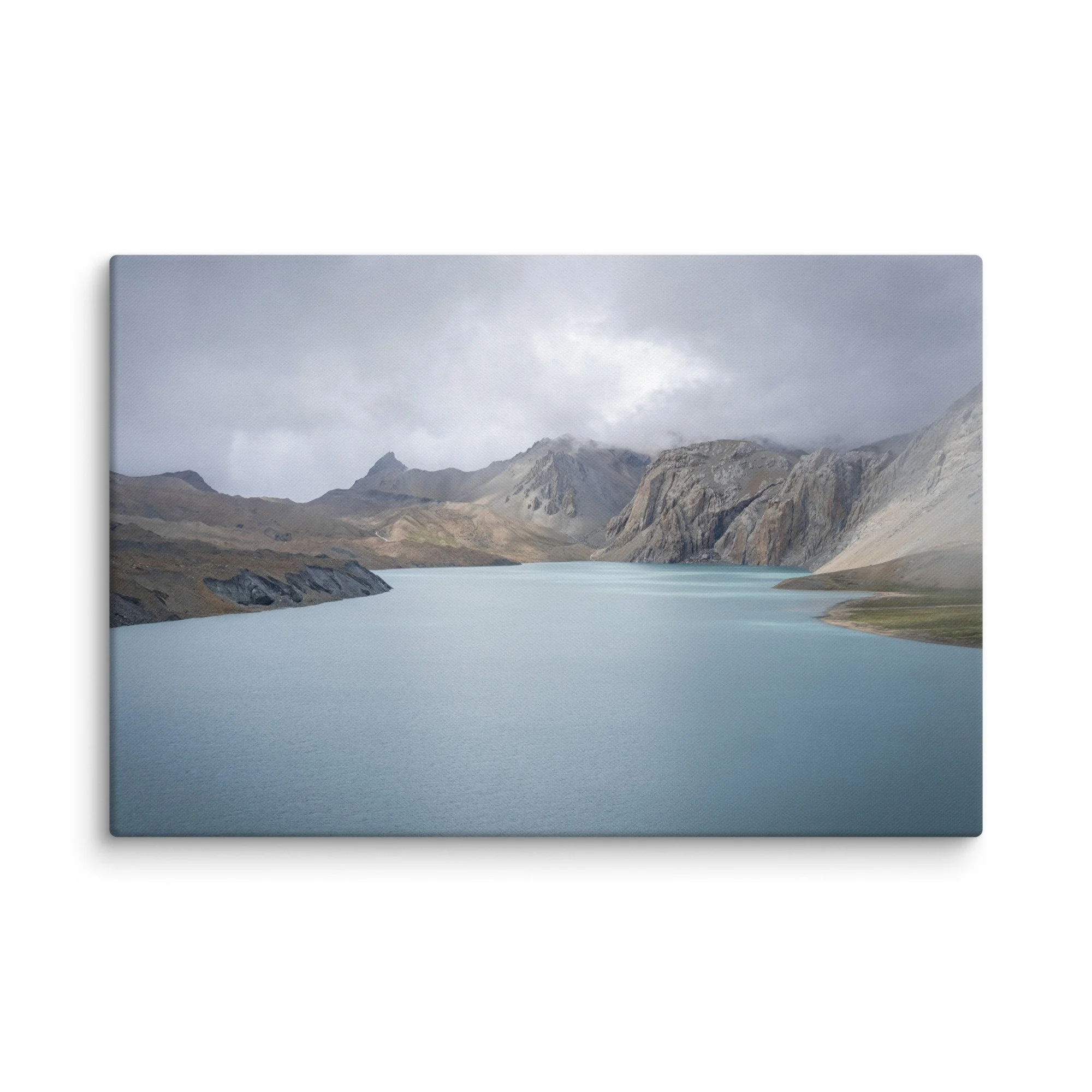 Turquoise glacial lake surrounded by rugged Himalayan peaks and snow-dusted ridges on the Annapurna Circuit, Nepal – high-altitude trekking travel photography canvas print wall art decor