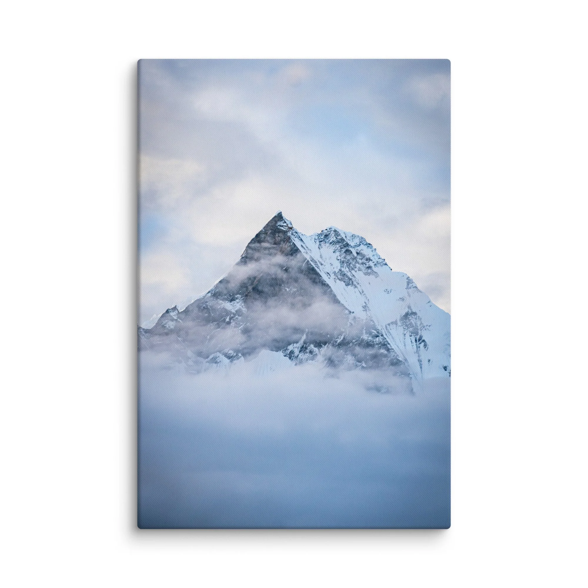 Majestic snow-covered Himalayan peak (Annapurna South or Machhapuchhre) rising through swirling clouds at Annapurna Base Camp, Nepal – high-altitude trekking spiritual travel