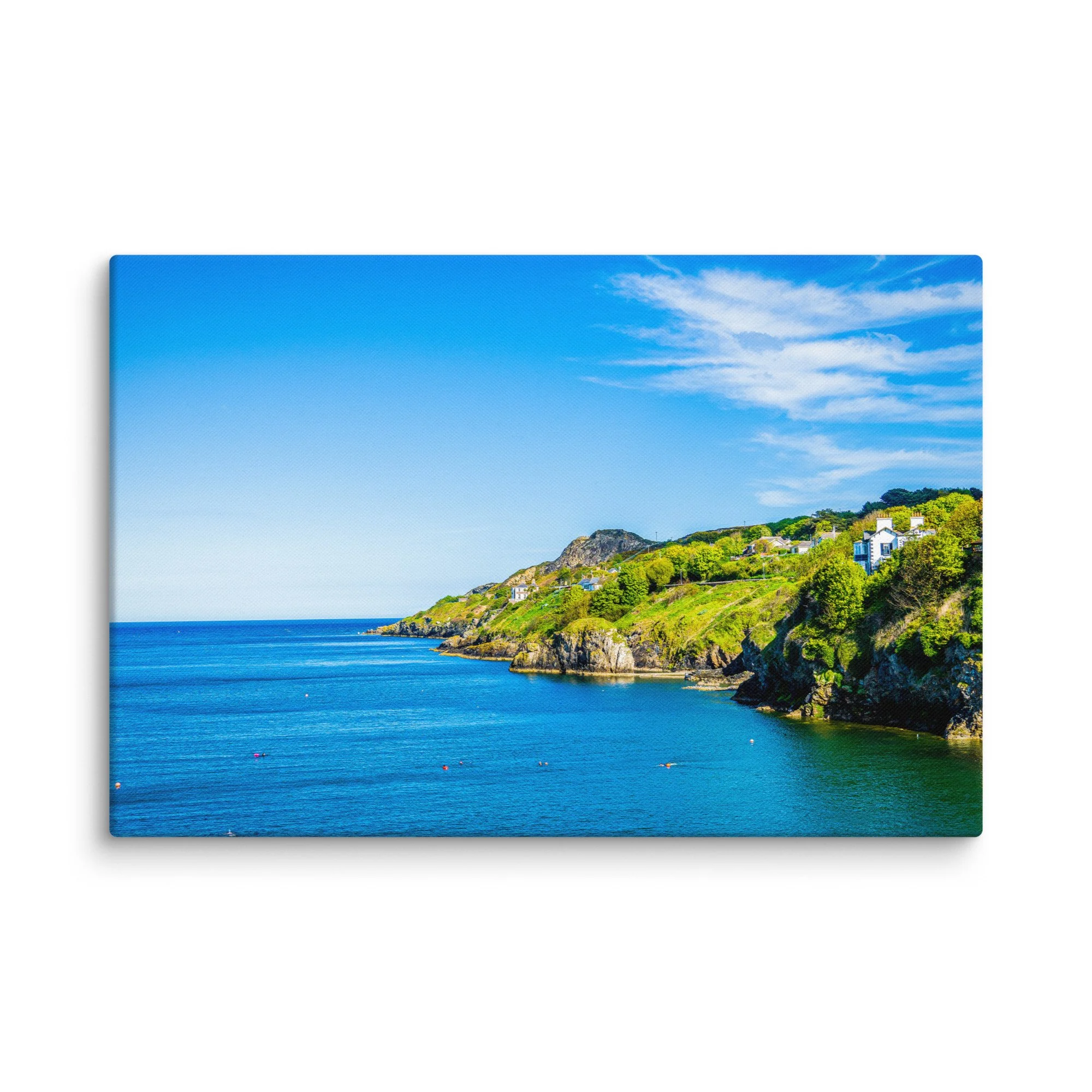 Panoramic view from Howth Cliff Walk, Ireland: turquoise bay, green cliffs with cottages and distant islands under bright blue sky – Celtic coastal travel photography canvas print wall art