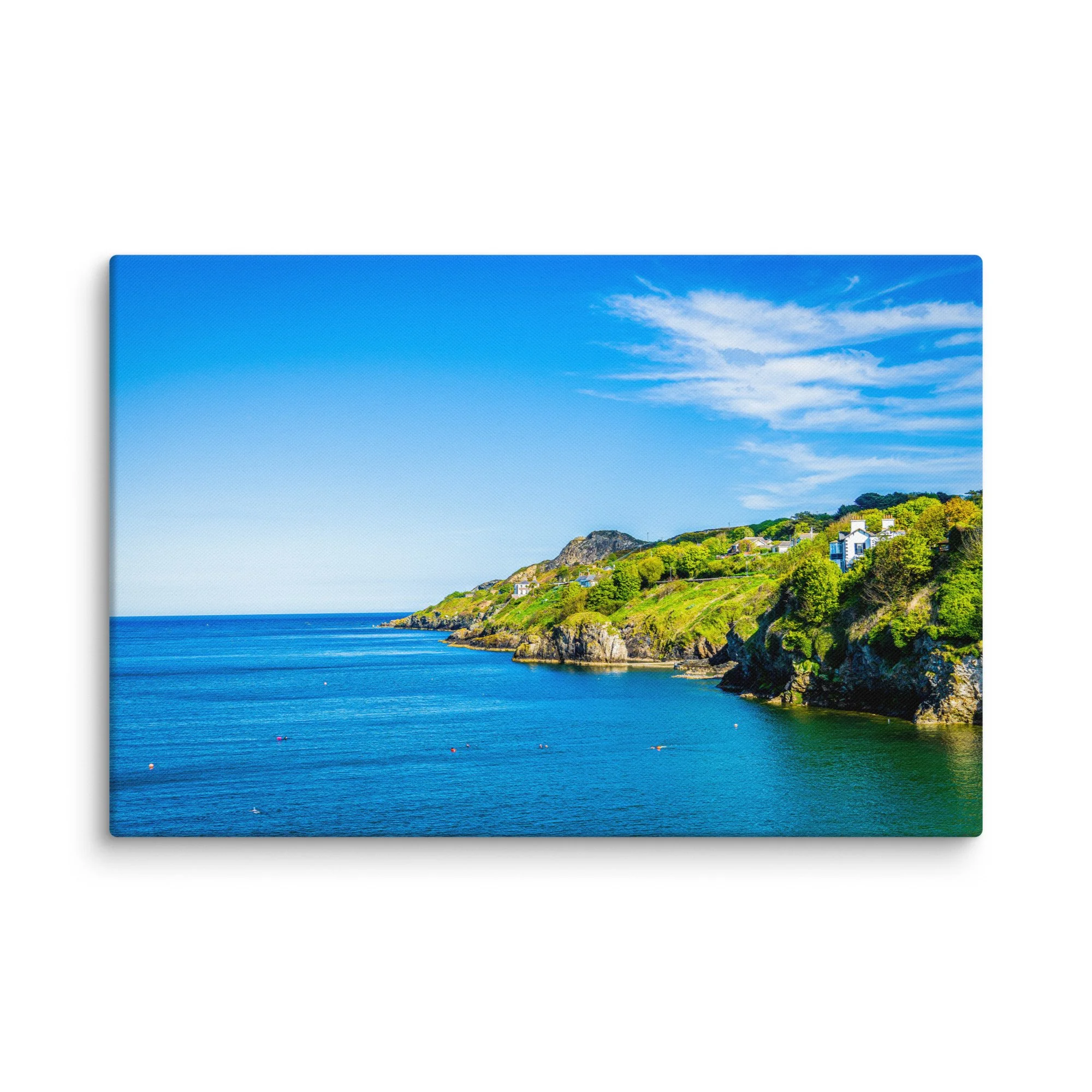 Panoramic view from Howth Cliff Walk, Ireland: turquoise bay, green cliffs with cottages and distant islands under bright blue sky – Celtic coastal travel photography canvas print wall art