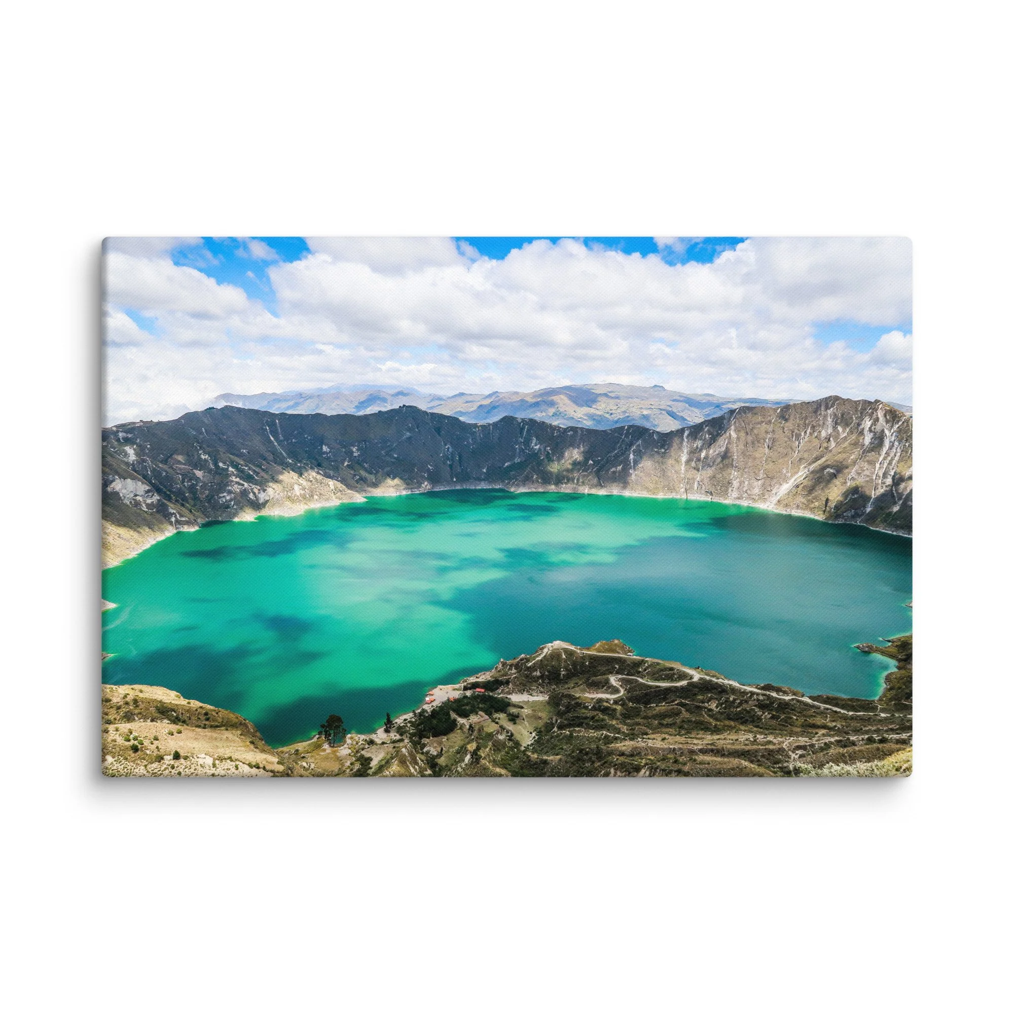 Panoramic view of vibrant turquoise Quilotoa Lagoon crater from the rim, surrounded by rugged volcanic walls and distant Andean peaks, Ecuador – high-altitude trekking travel