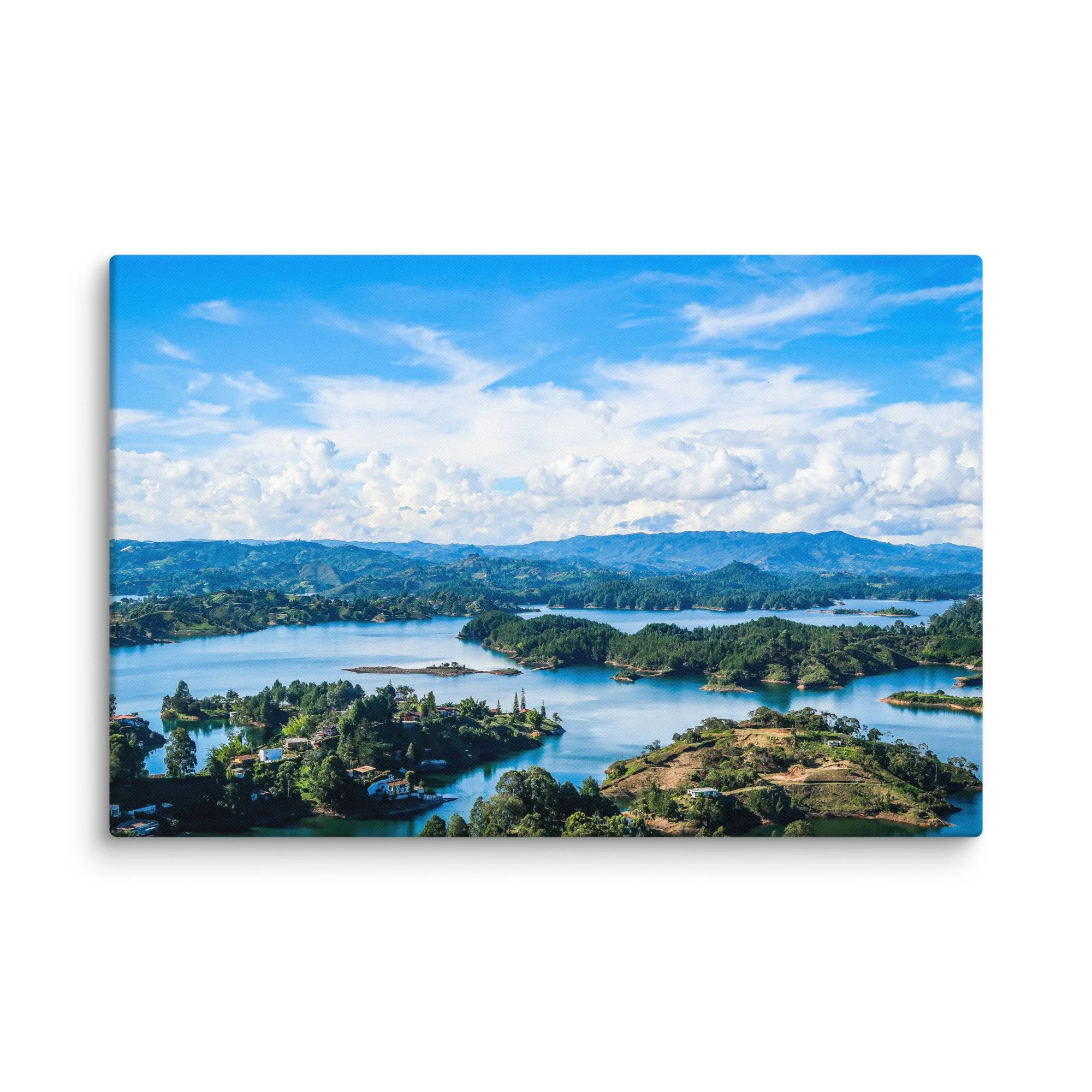 Aerial panoramic view of turquoise Guatapé Reservoir with lush green islands, tropical vegetation and distant Andean mountains, Colombia – tropical lake travel photography canvas print