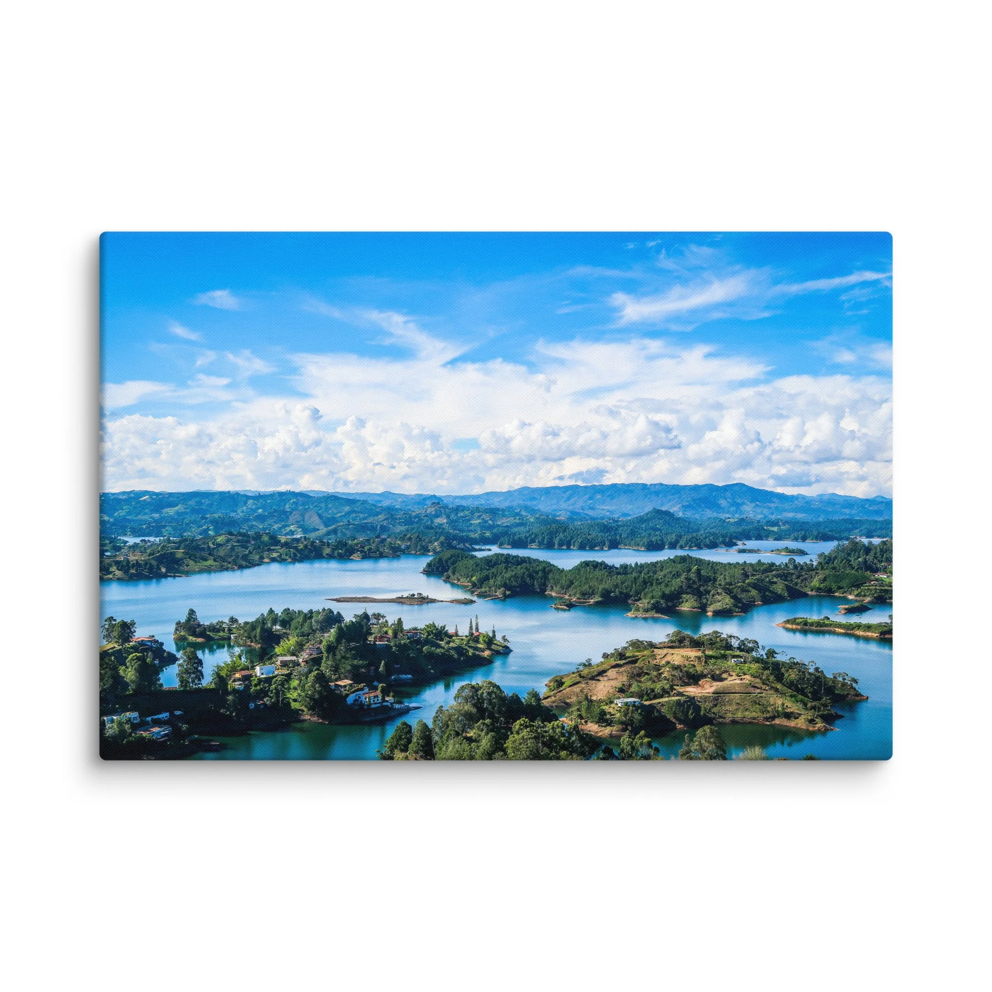 Aerial panoramic view of turquoise Guatapé Reservoir with lush green islands, tropical vegetation and distant Andean mountains, Colombia – tropical lake travel photography canvas print