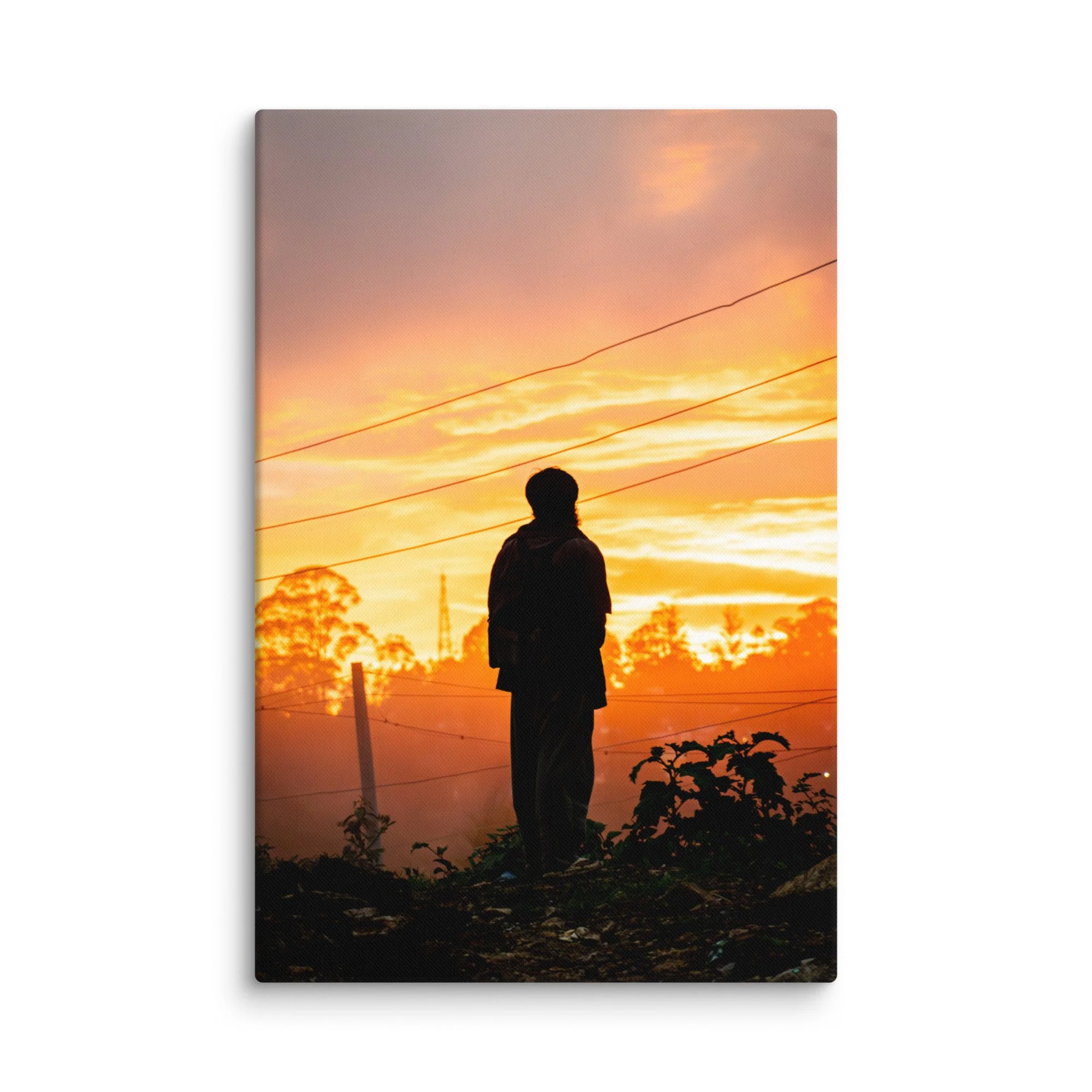 Lone figure silhouetted against dramatic golden sunset in misty Nilgiri hills, Tamil Nadu, South India – highland travel photography canvas print wall art decor
