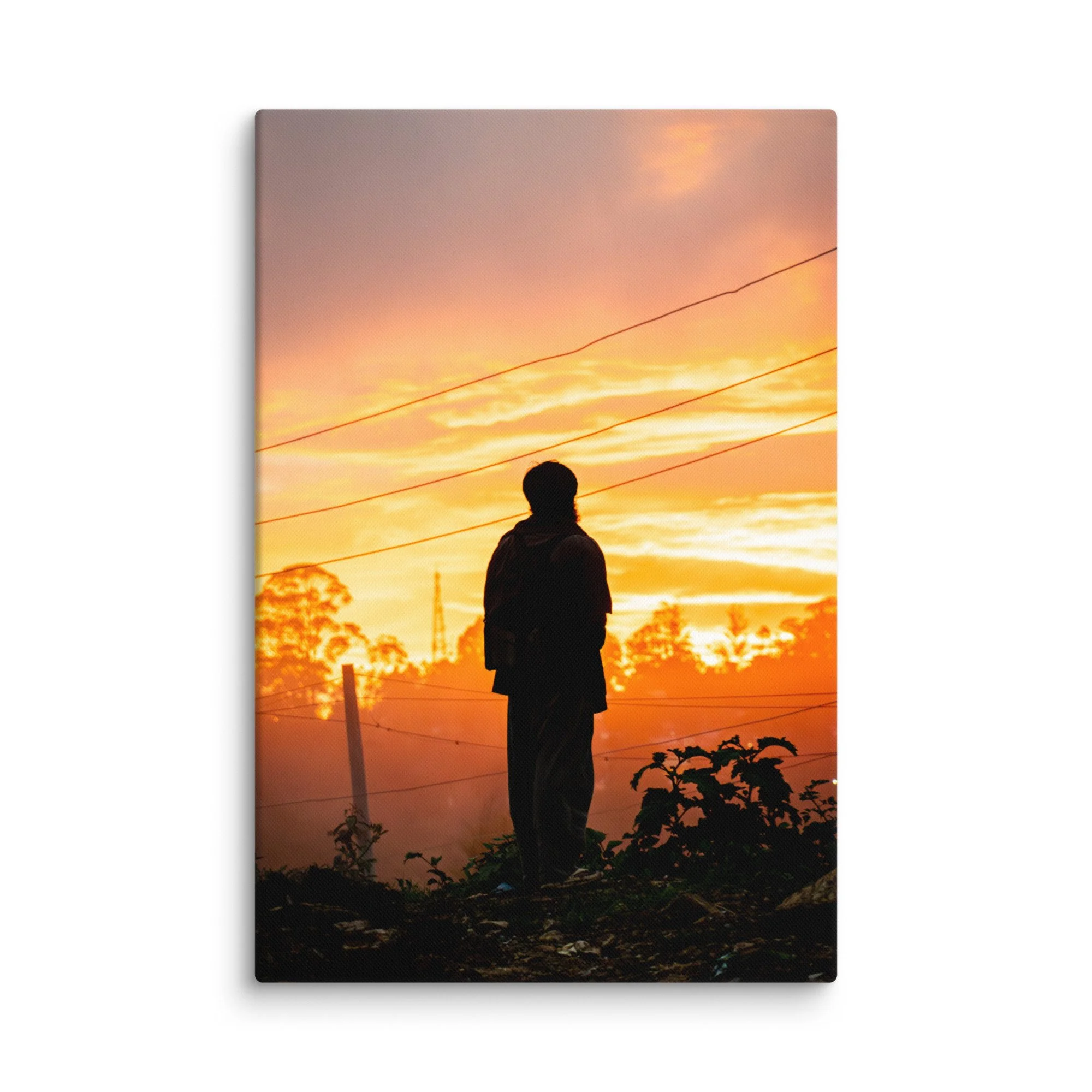 Lone figure silhouetted against dramatic golden sunset in misty Nilgiri hills, Tamil Nadu, South India – highland travel photography canvas print wall art decor