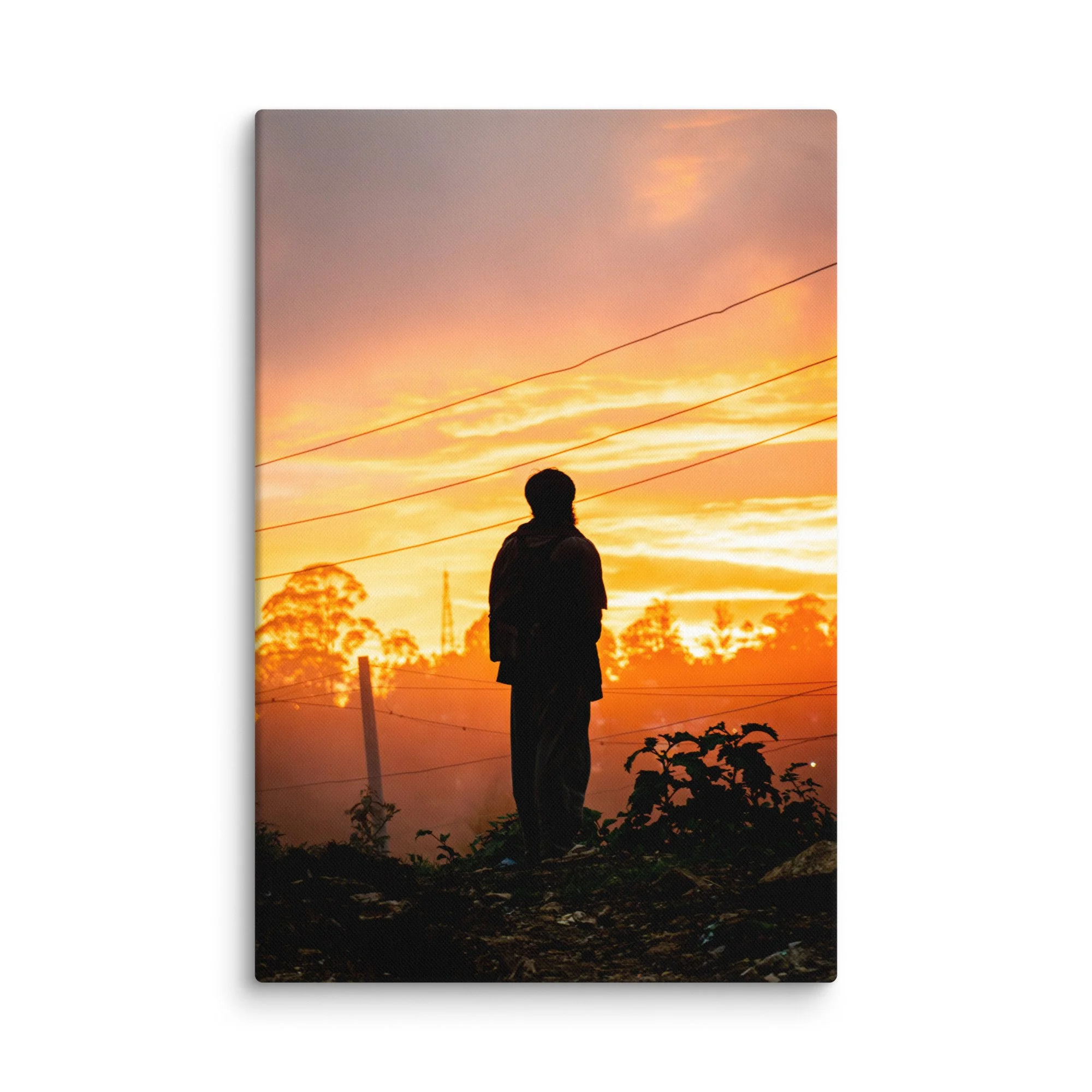 Lone figure silhouetted against dramatic golden sunset in misty Nilgiri hills, Tamil Nadu, South India – highland travel photography canvas print wall art decor