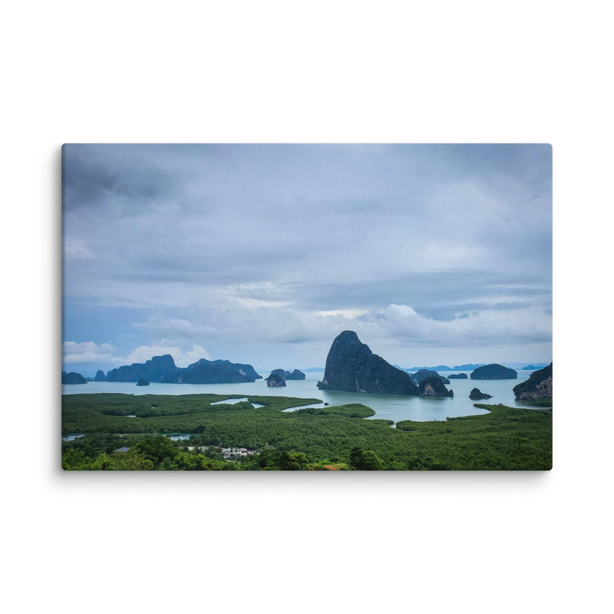 Panoramic view of emerald waters and dramatic limestone karsts in Ha Long Bay, Vietnam, with lush mangroves and misty mountains – tropical travel photography canvas print wall art decor