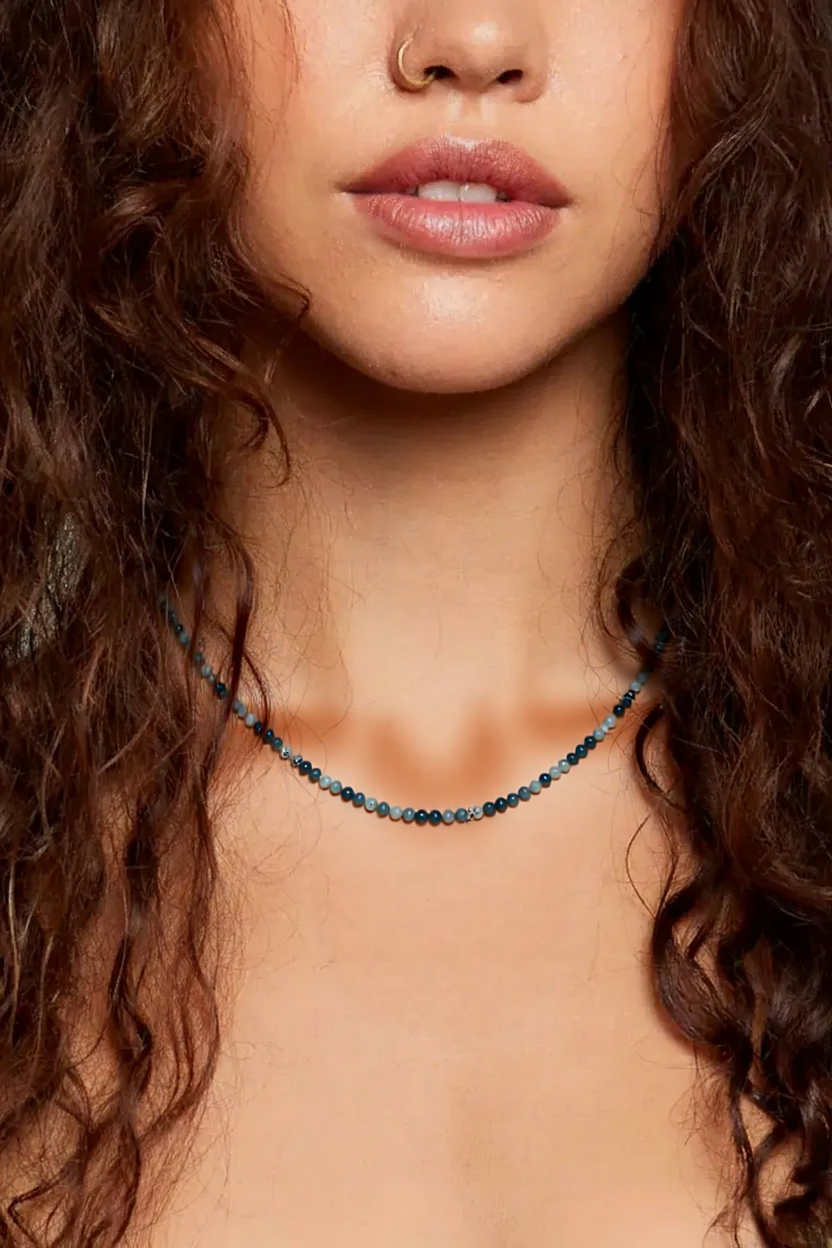 Aquamarine on neck.png