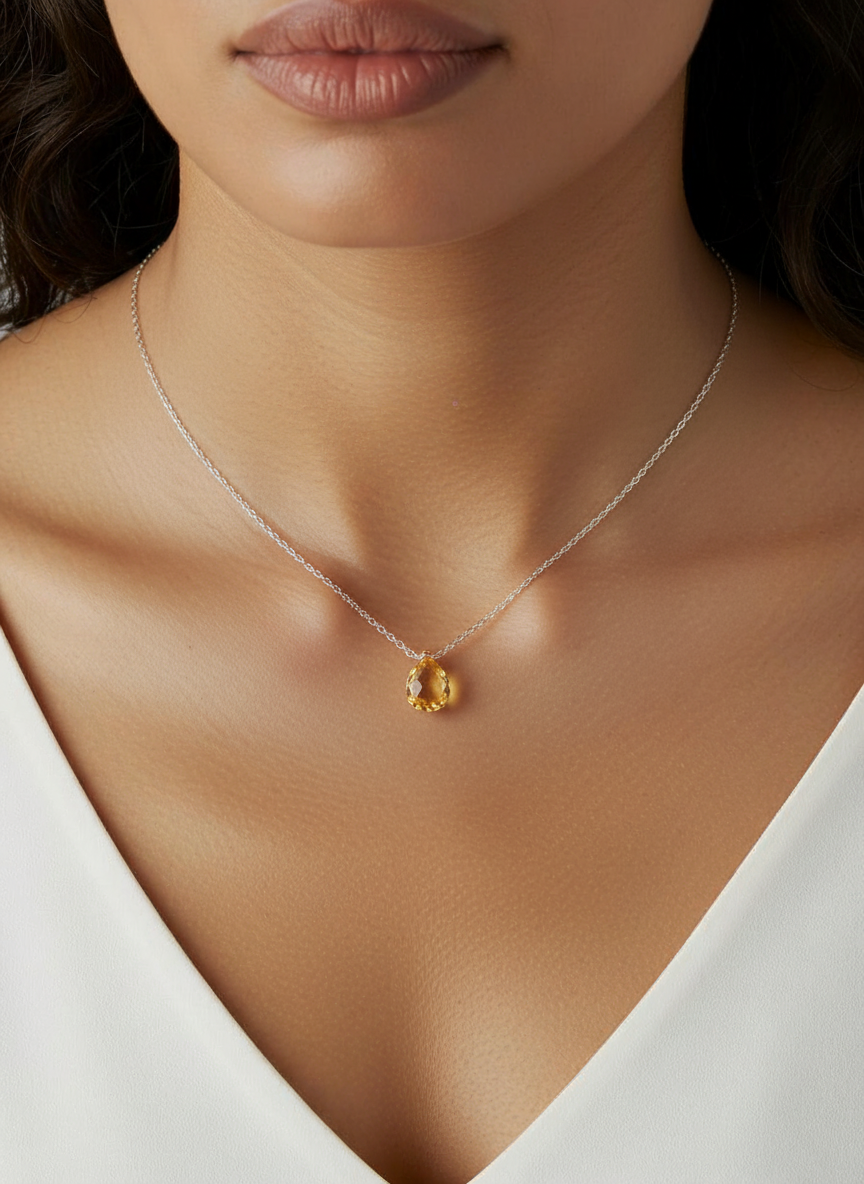 citrine rhea on neck.png