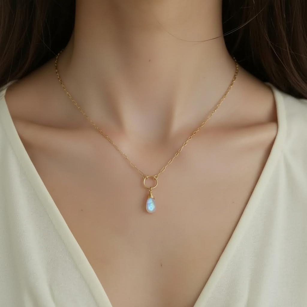 moonstone nyx in gold on model.png